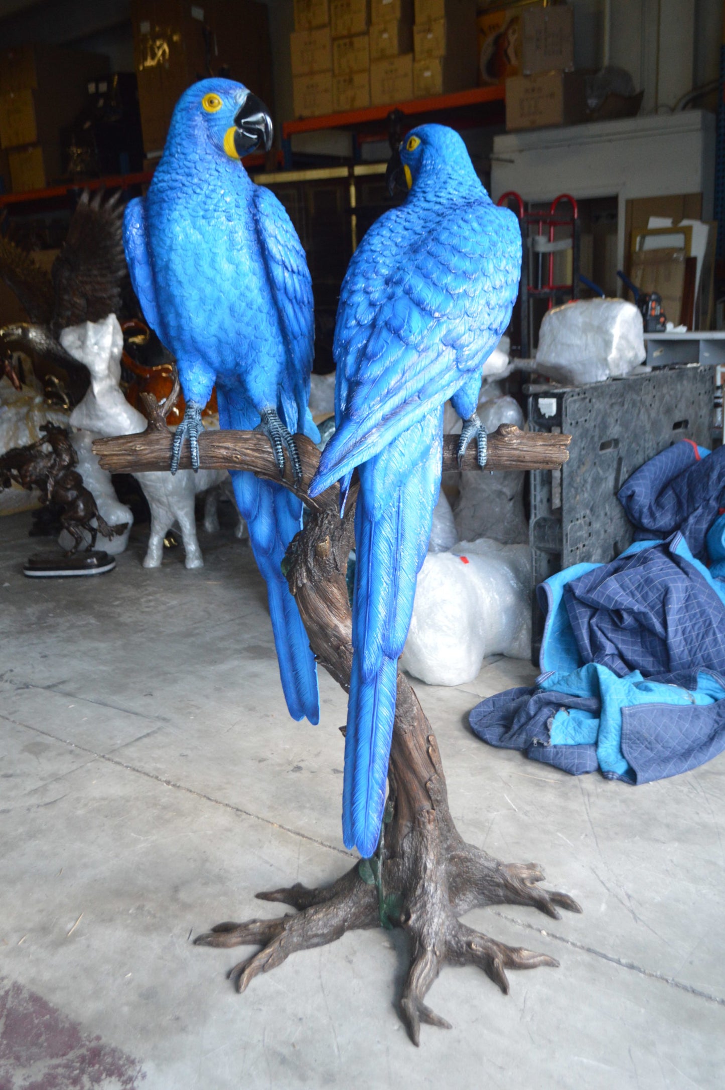 Pair of Blue Parrots on a tree - Bronze Statue - Size: 43"L x 28"W x 67"H.