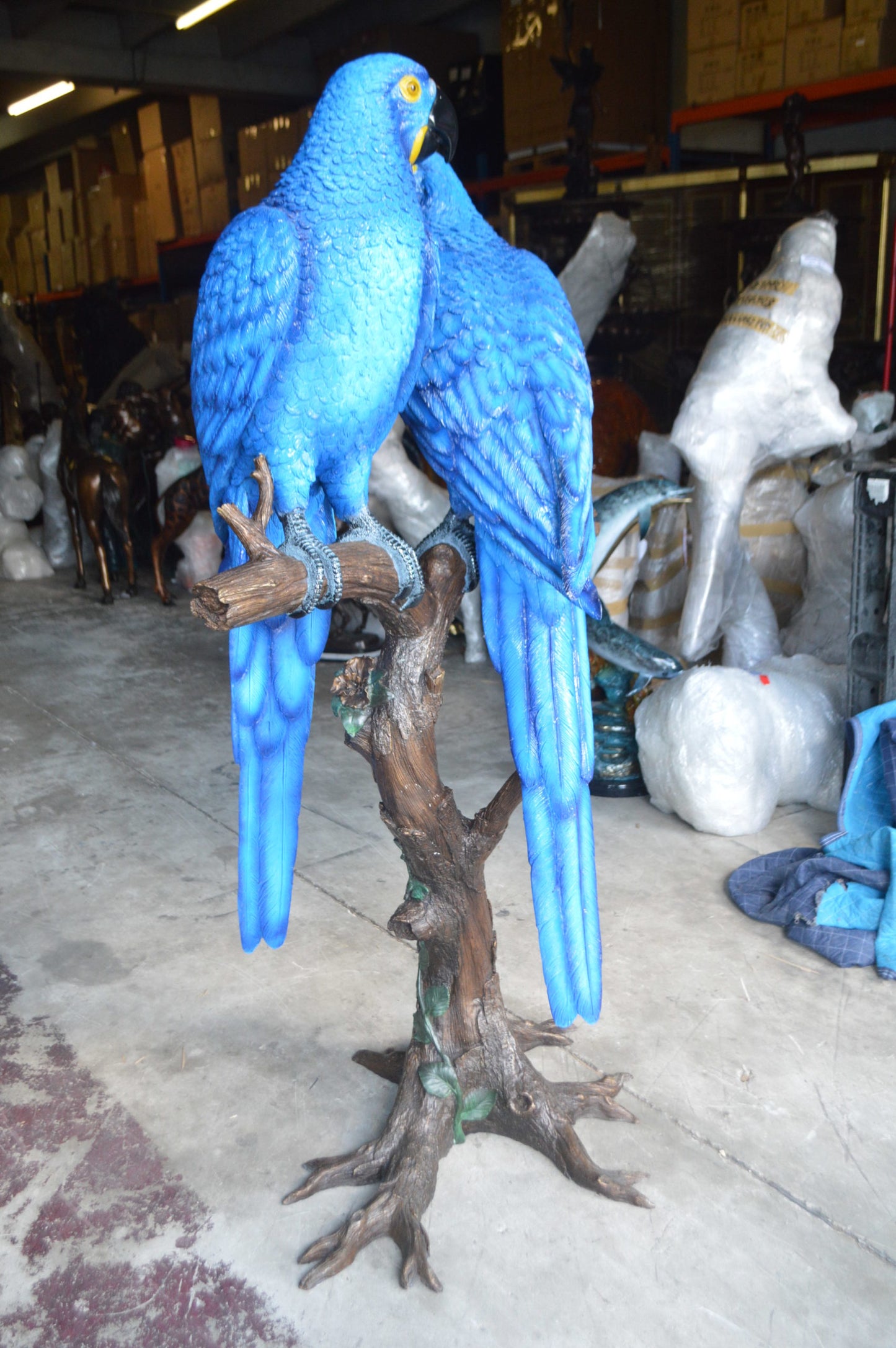 Pair of Blue Parrots on a tree - Bronze Statue - Size: 43"L x 28"W x 67"H.
