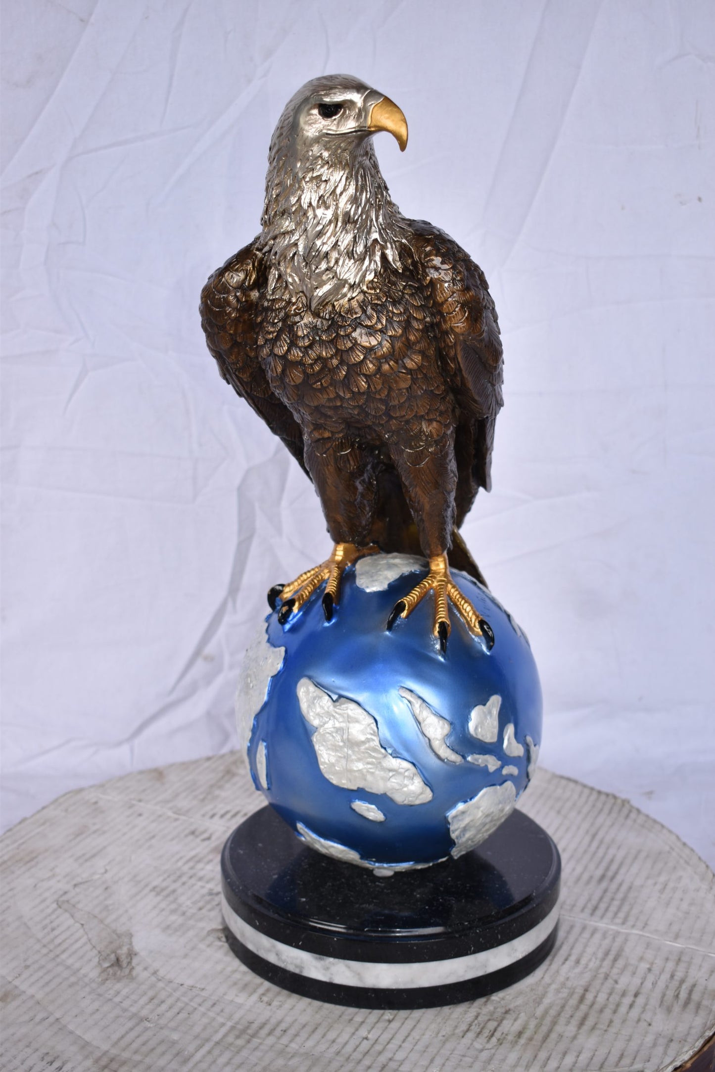 Bald Eagle Standing on a Blue Globe Bronze Statue Size: 17" x 9" x 23"H