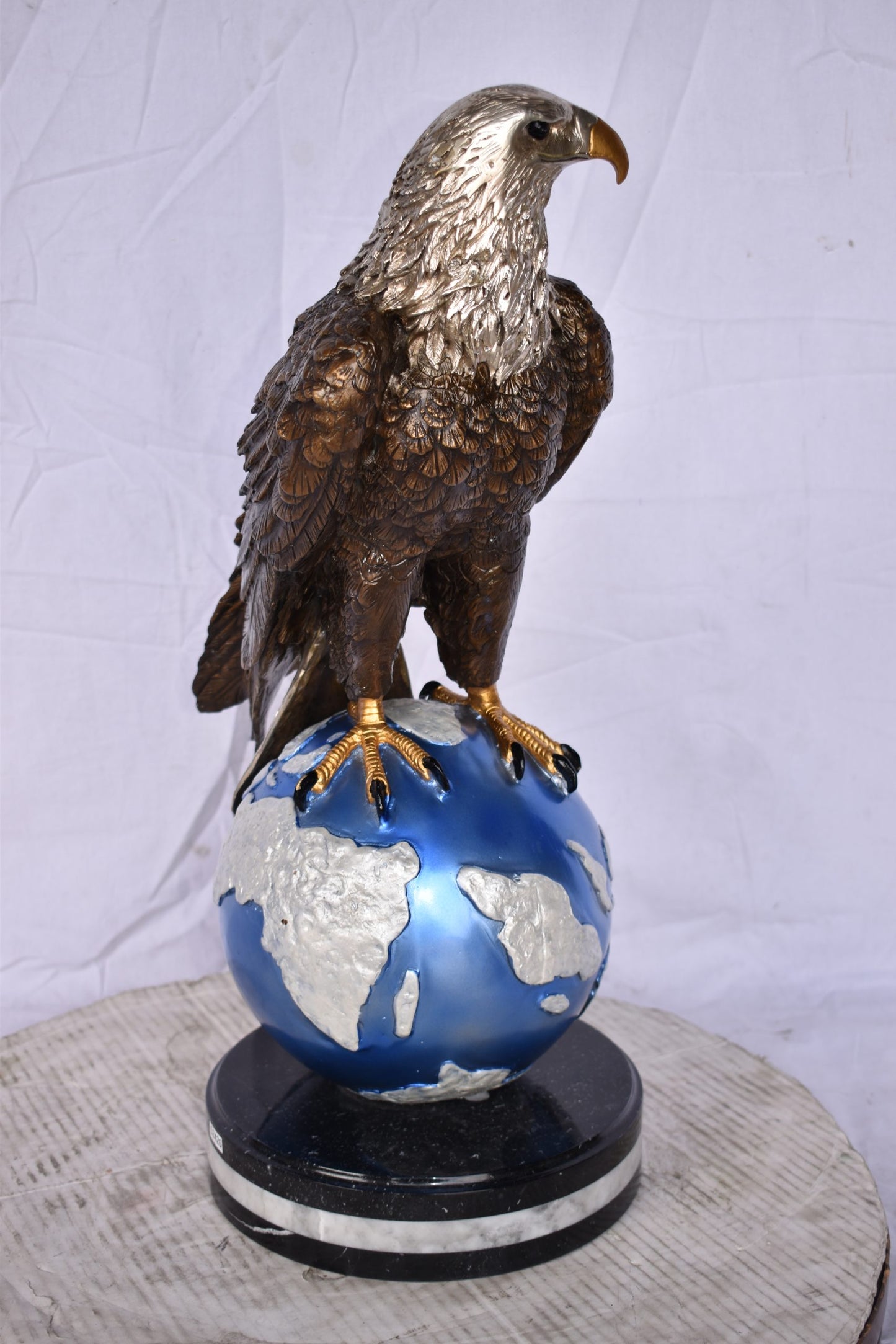 Bald Eagle Standing on a Blue Globe Bronze Statue Size: 17" x 9" x 23"H