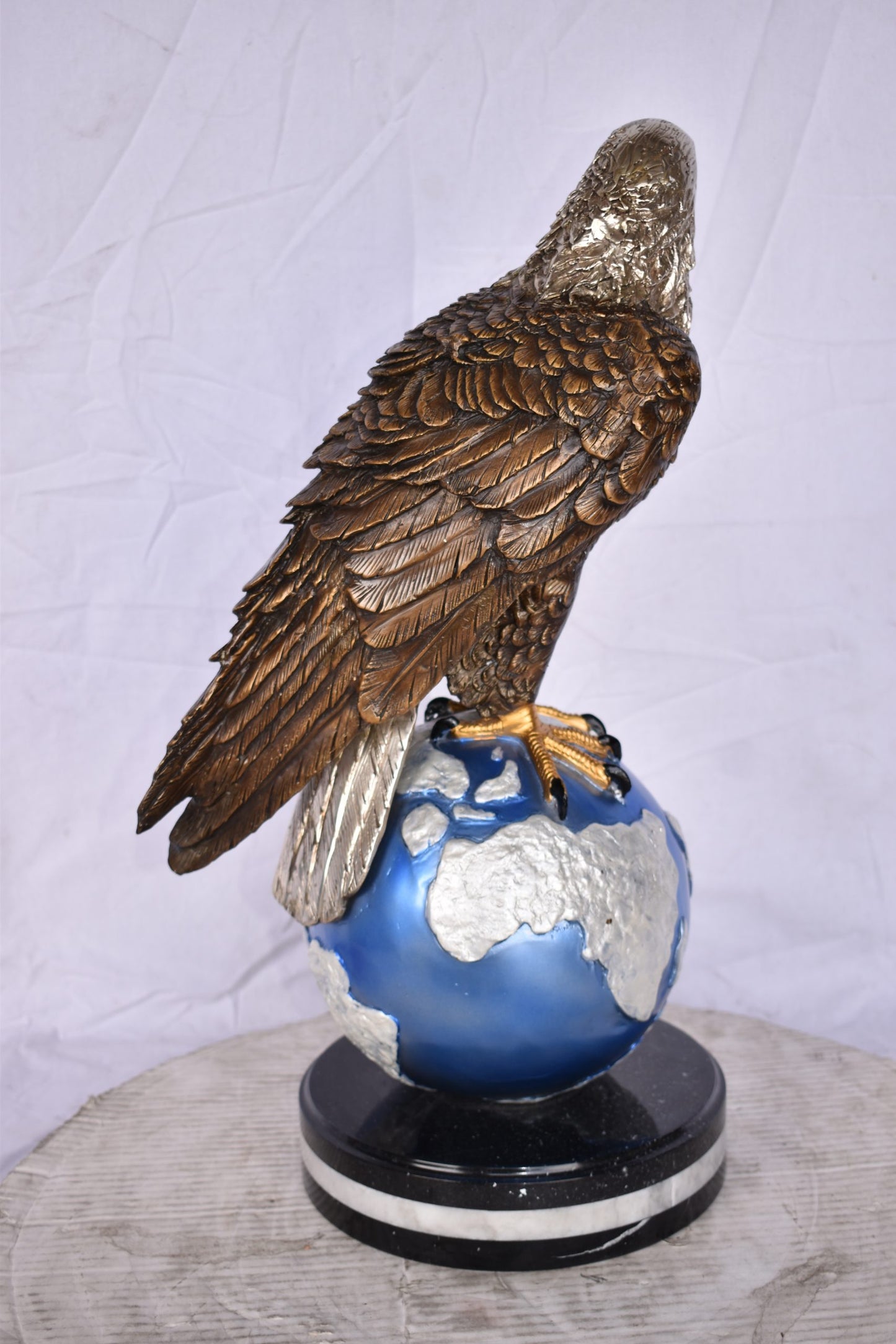 Bald Eagle Standing on a Blue Globe Bronze Statue Size: 17" x 9" x 23"H