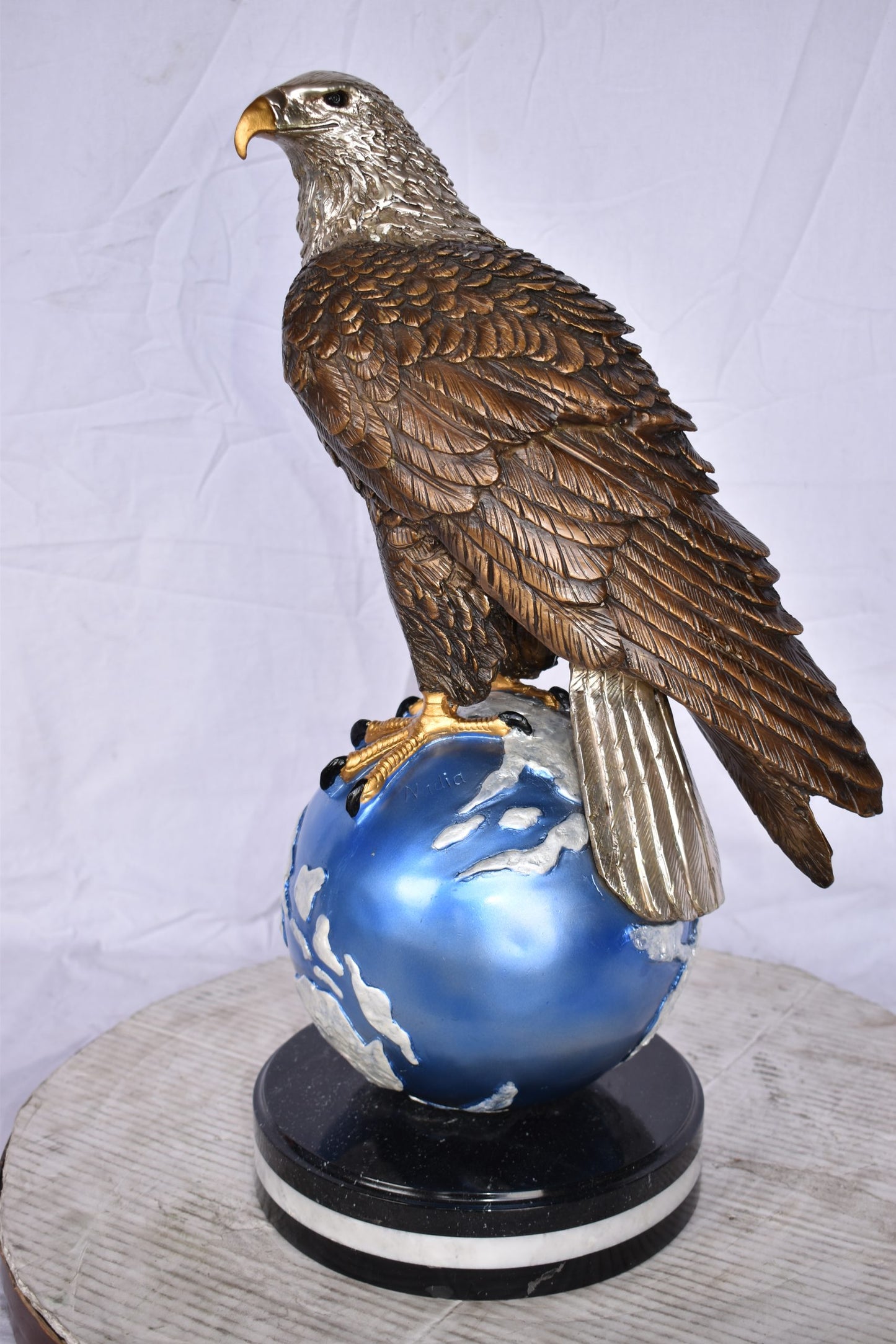 Bald Eagle Standing on a Blue Globe Bronze Statue Size: 17" x 9" x 23"H