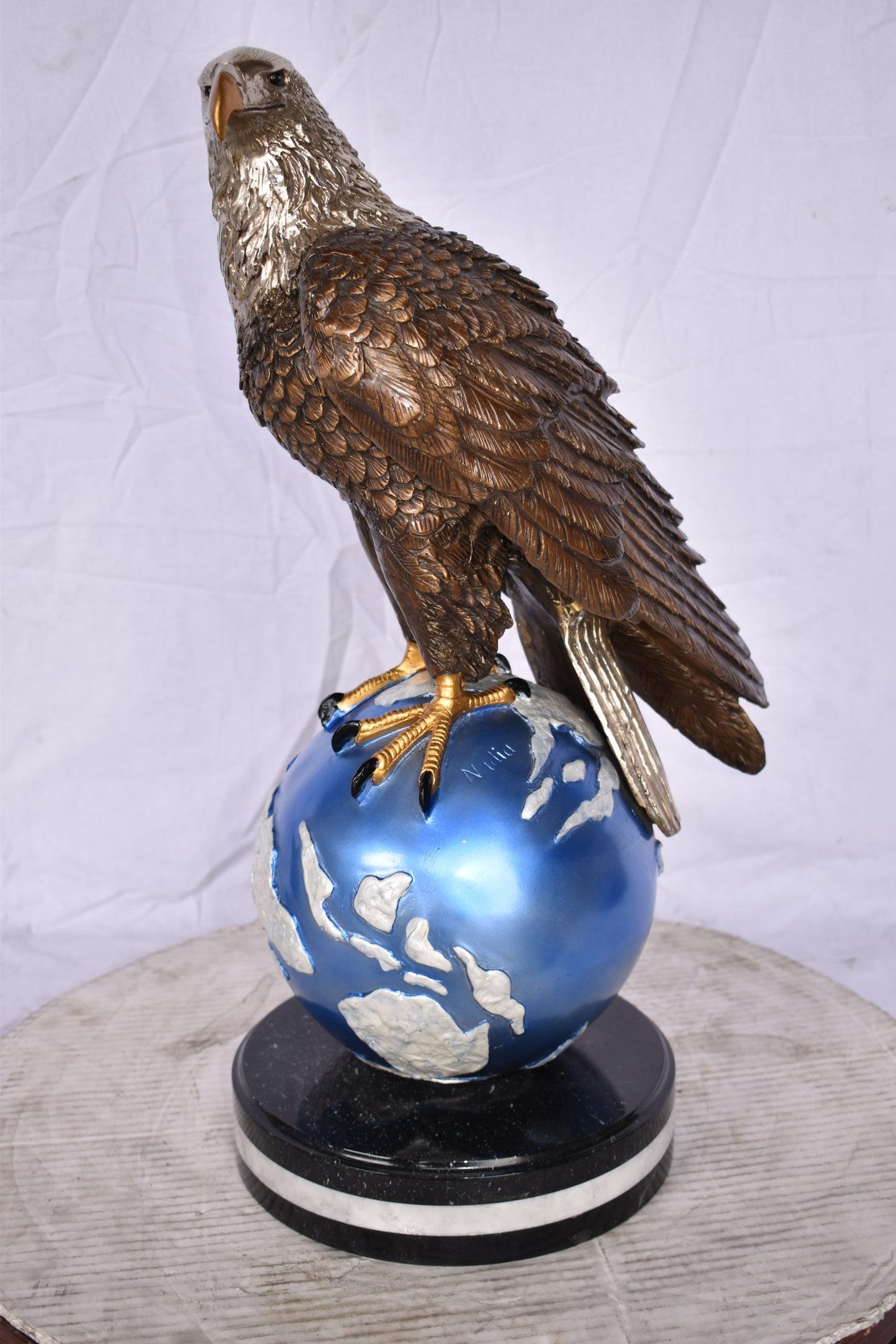 Bald Eagle Standing on a Blue Globe Bronze Statue Size: 17" x 9" x 23"H