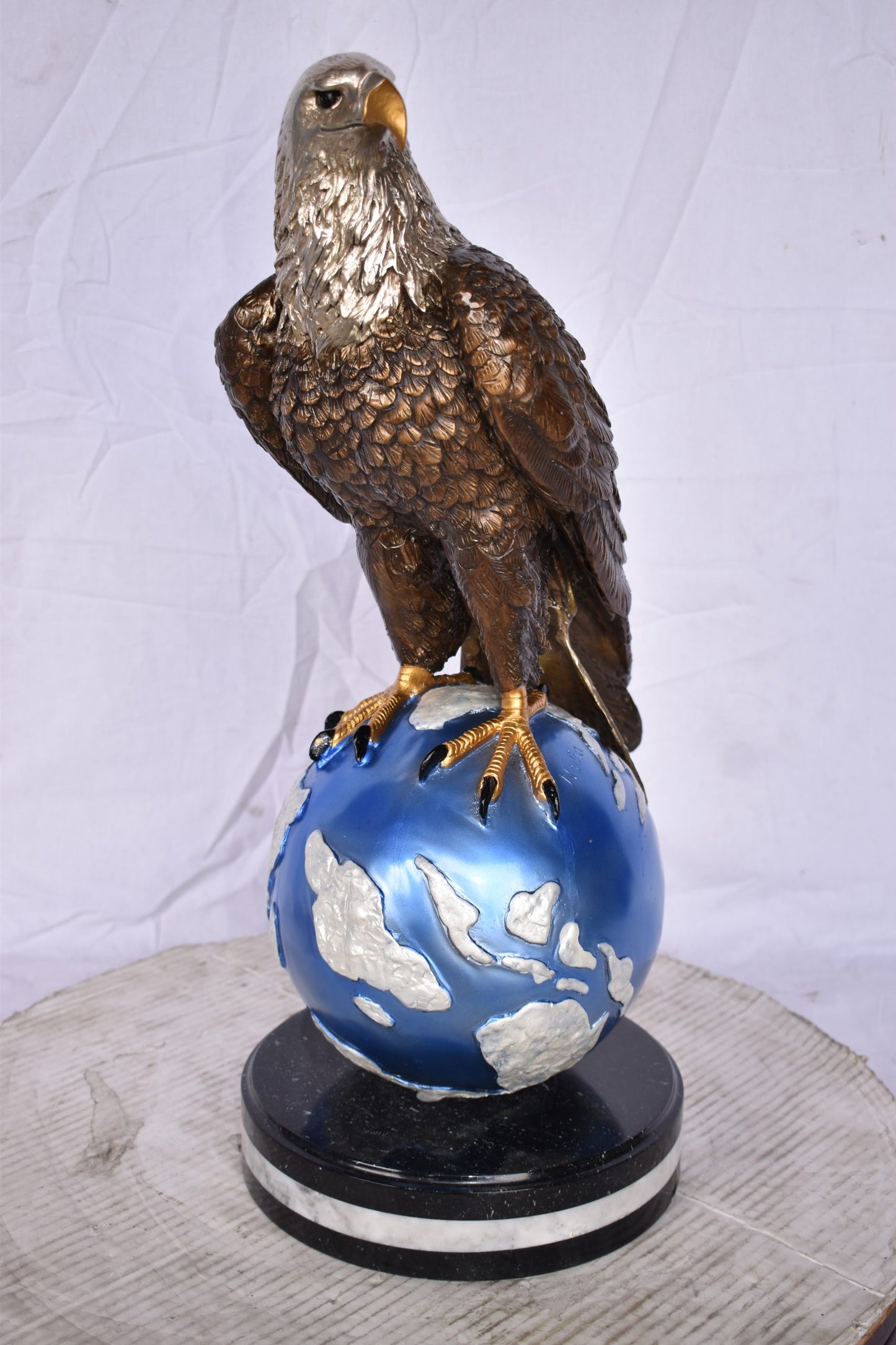 Bald Eagle Standing on a Blue Globe Bronze Statue Size: 17" x 9" x 23"H