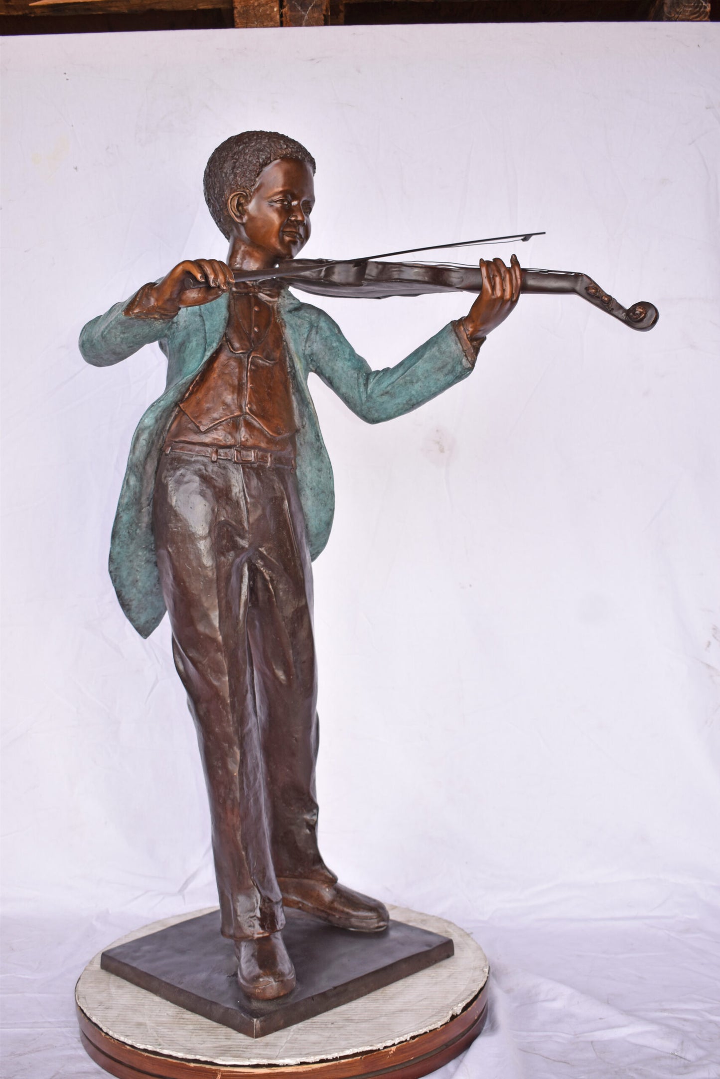African American Boy playing violin bronze statue - Size: 31"L x 28"W x 50"H.