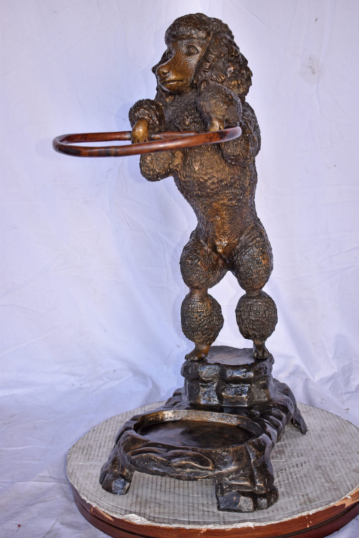Standard Poodle Dog Hooding A Ring Bronze Statue - Size: 18"L x 13"W x 34"H.
