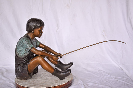 Boy Sitting on the Ground, Fishing Bronze Statue - Size: 26"L x 15"W x 25"H.