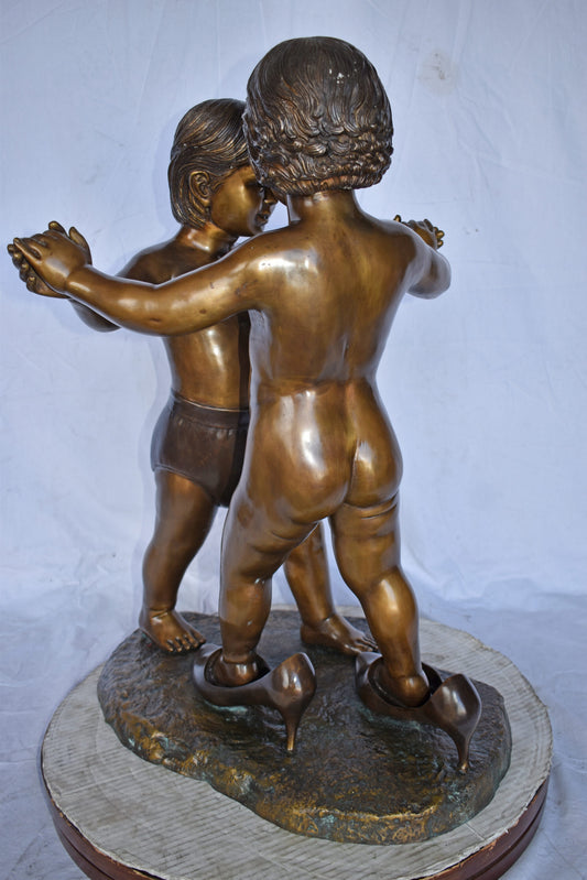 Girl with Big Shoes Dancing with A Boy Bronze Art Nude 21"L x 15"W x 30"H.