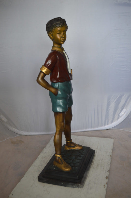 Kid Holding a Book Bronze Statue - Size: 18"L x 11"W x 36"H.