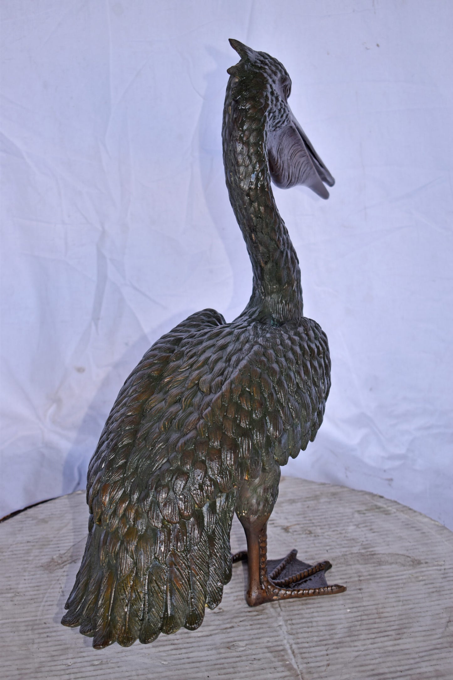 Pelican Standing and Looking Ahead Bronze Statue - Size: 27"L x 8"W x 22"H.