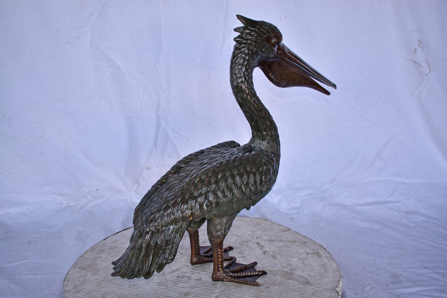 Pelican Standing and Looking Ahead Bronze Statue - Size: 27"L x 8"W x 22"H.