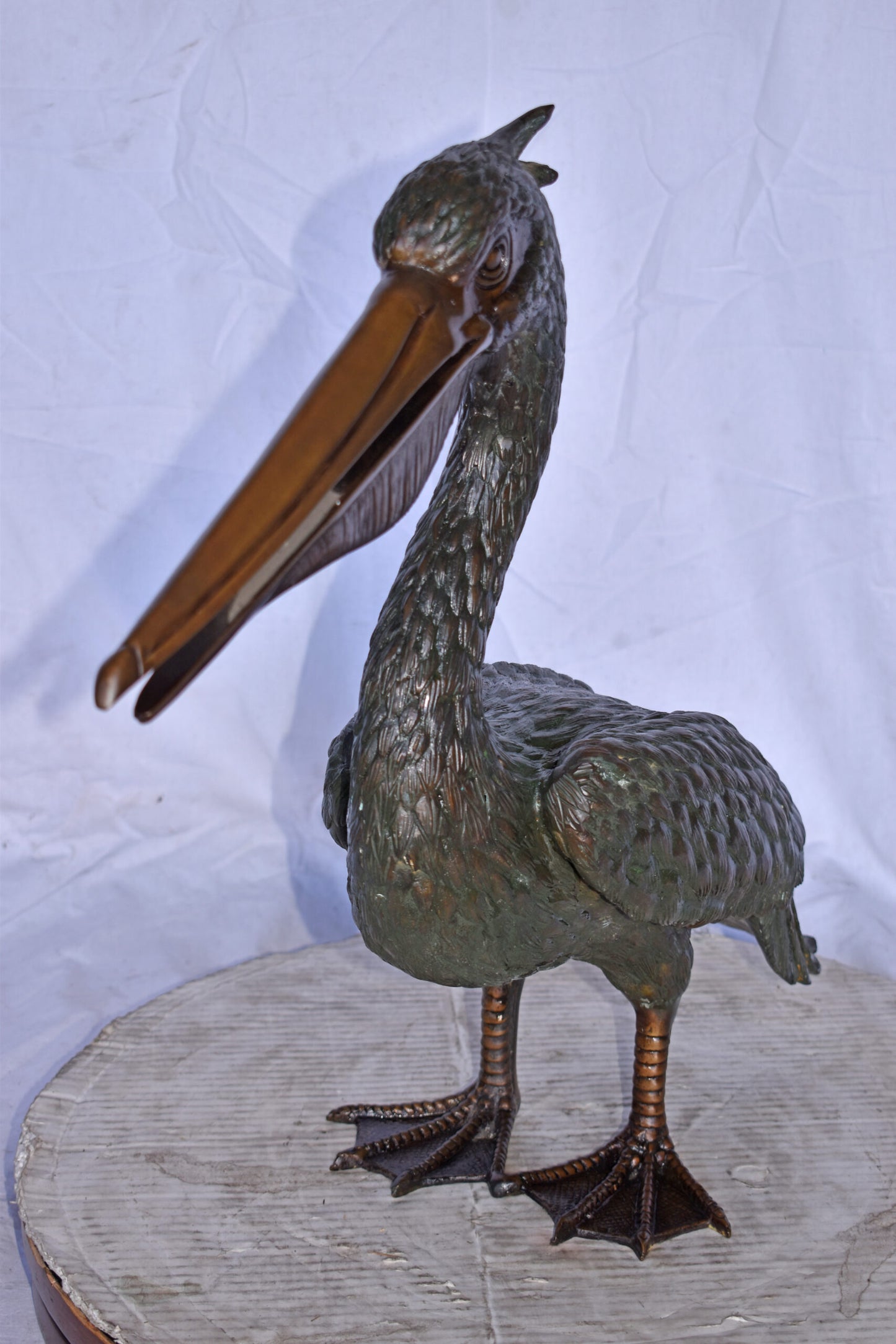 Pelican Standing and Looking Ahead Bronze Statue - Size: 27"L x 8"W x 22"H.
