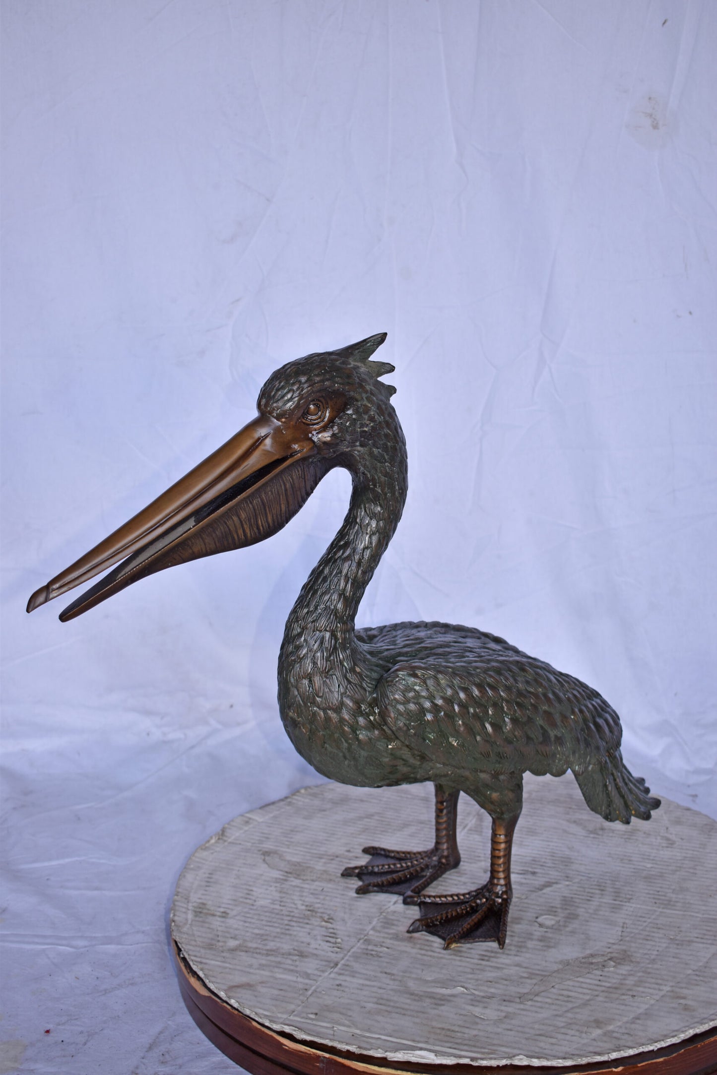 Pelican Standing and Looking Ahead Bronze Statue - Size: 27"L x 8"W x 22"H.