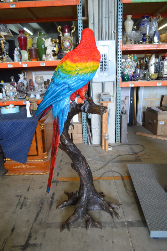 Single Red and Blue Parrot on a tree Bronze Statue - Size: 30"L x 24"W x 66"H.