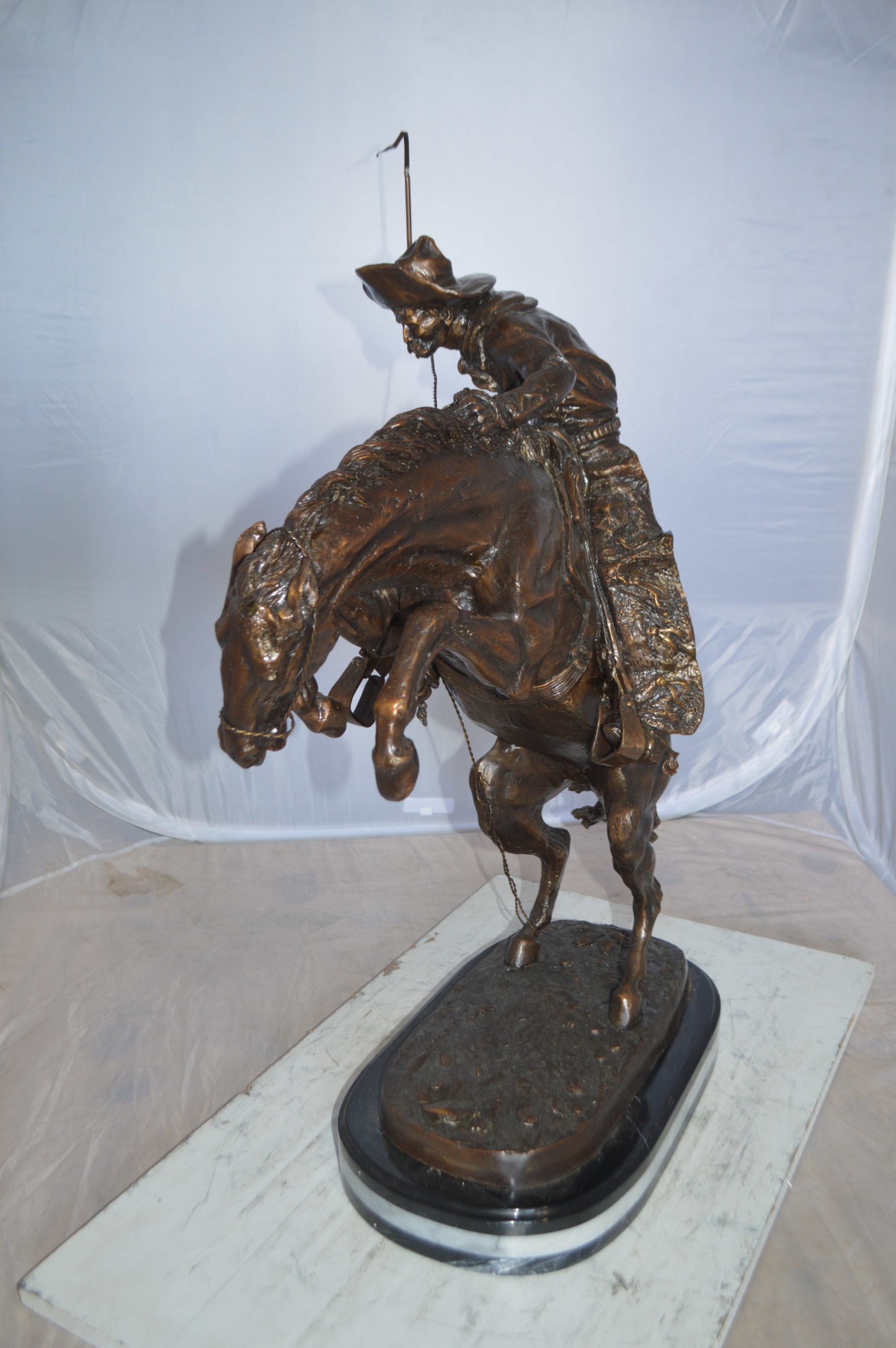 Jumbo Bronco Buster by Remington Bronze Statue - Size: 19"L x 11"W x 36"H.