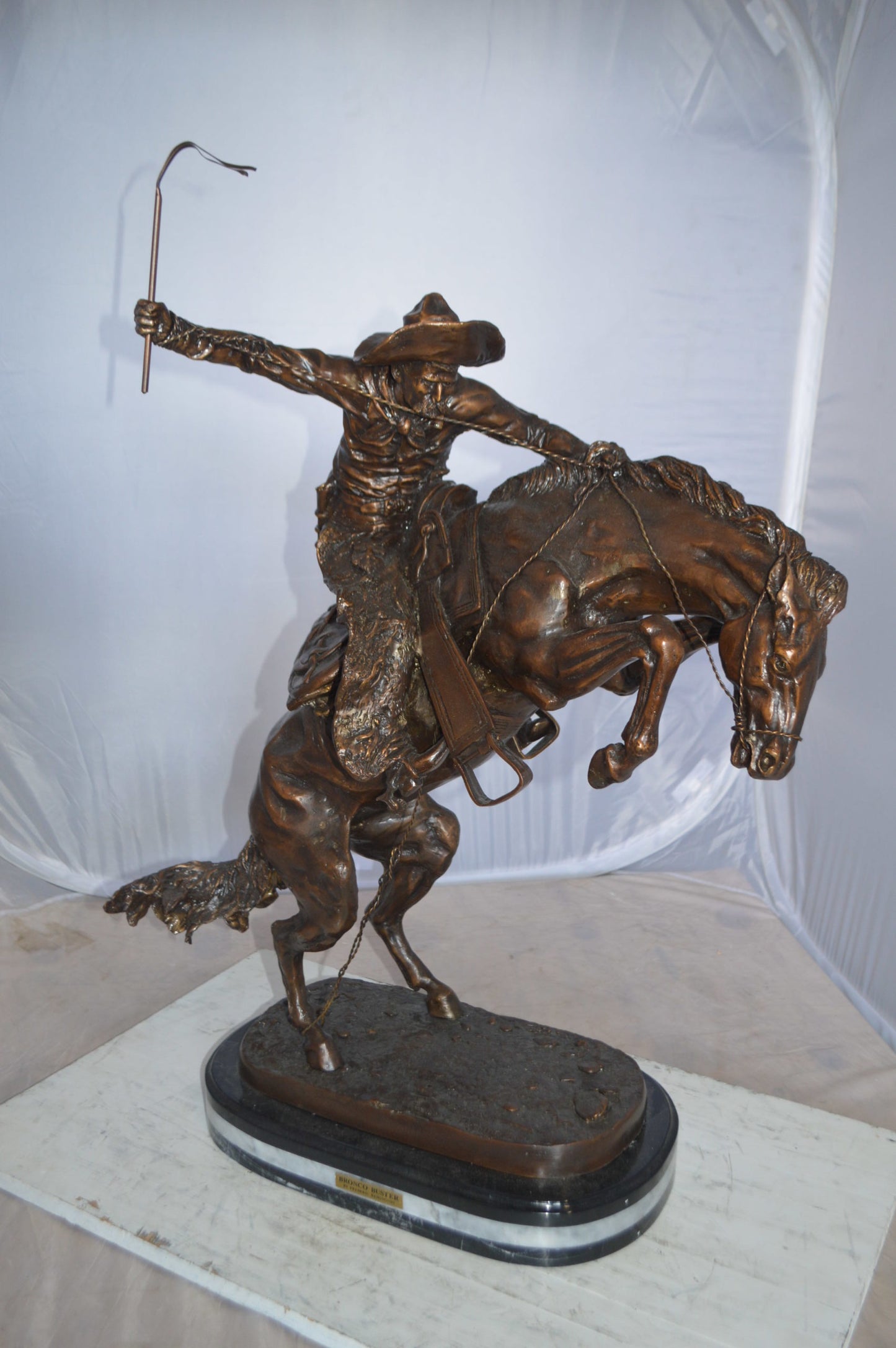 Jumbo Bronco Buster by Remington Bronze Statue - Size: 19"L x 11"W x 36"H.