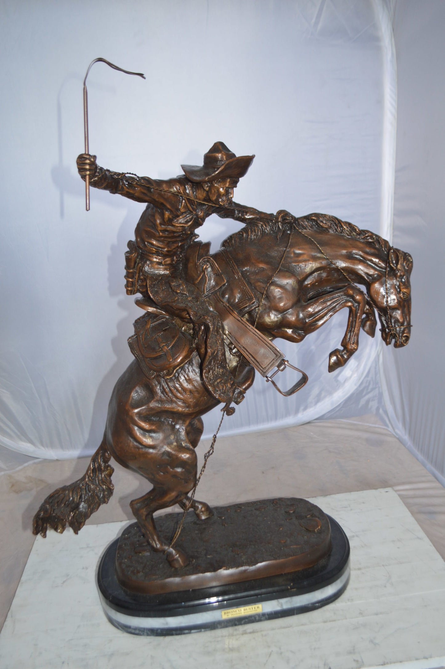 Jumbo Bronco Buster by Remington Bronze Statue - Size: 19"L x 11"W x 36"H.