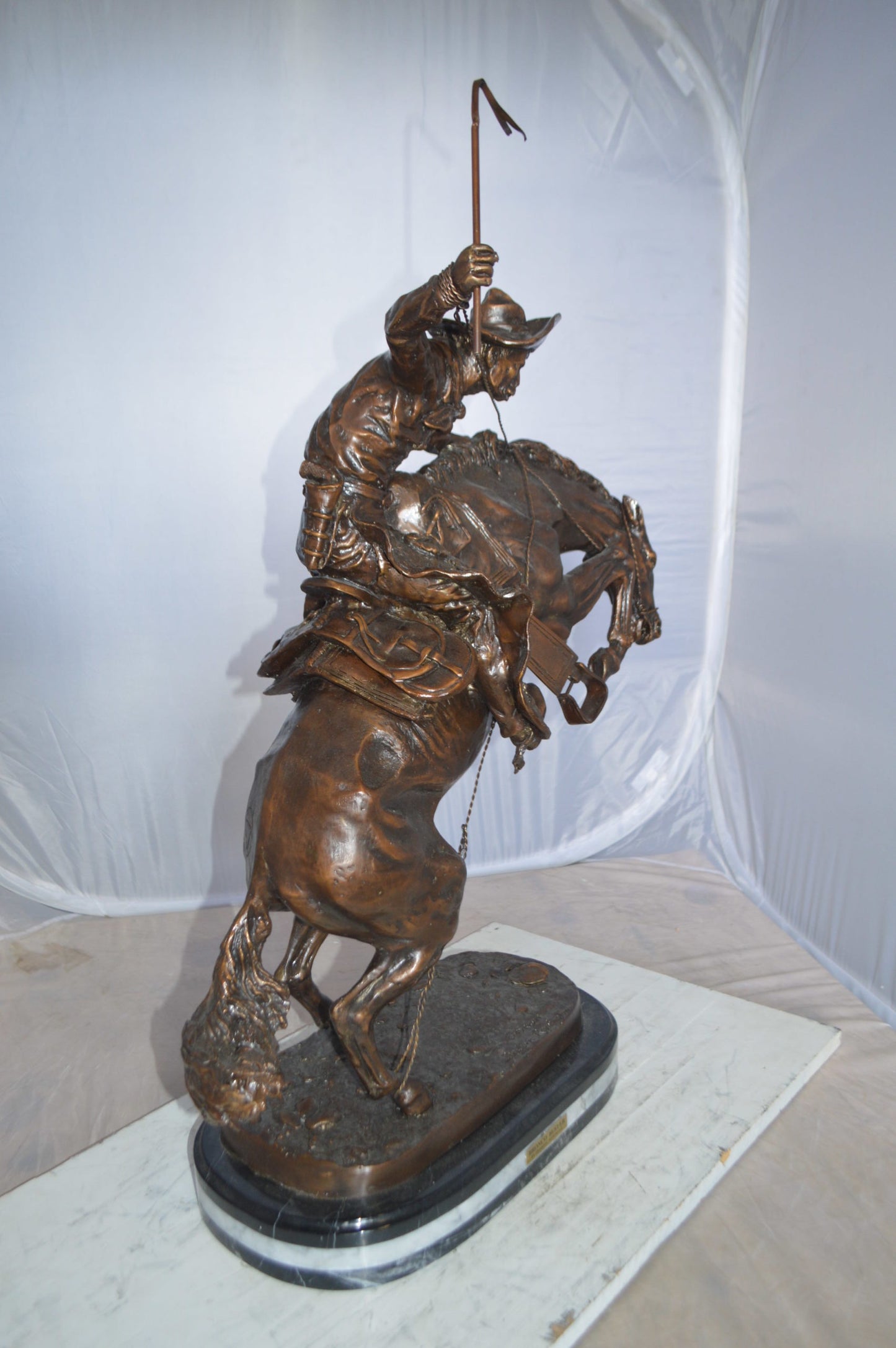 Jumbo Bronco Buster by Remington Bronze Statue - Size: 19"L x 11"W x 36"H.