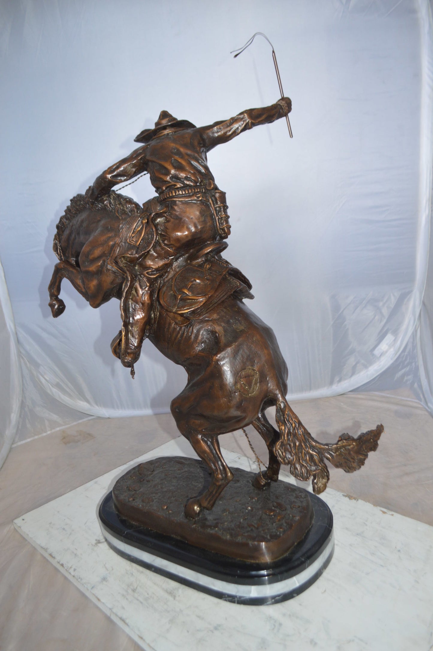 Jumbo Bronco Buster by Remington Bronze Statue - Size: 19"L x 11"W x 36"H.