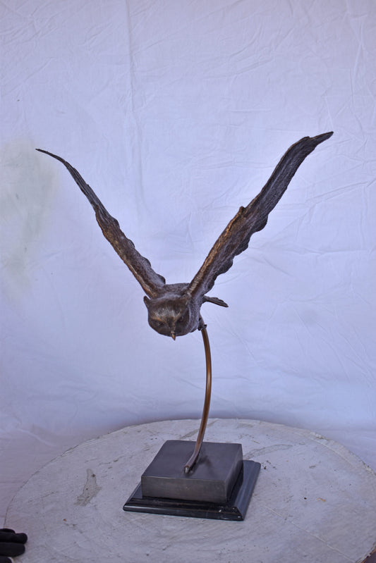 Owl Searching for Prey Bronze Statue - Size: 18"L x 11"W x 22"H.