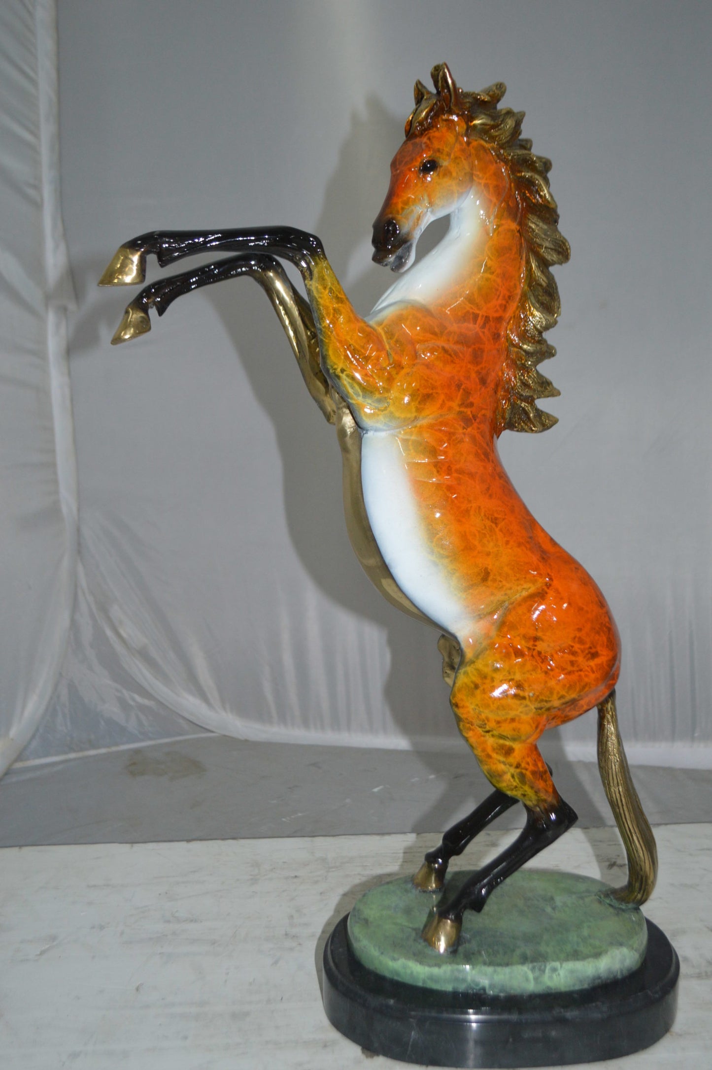 Horse on a Marble Base Bronze Statue - Size: 20"L x 8"W x 27"H.