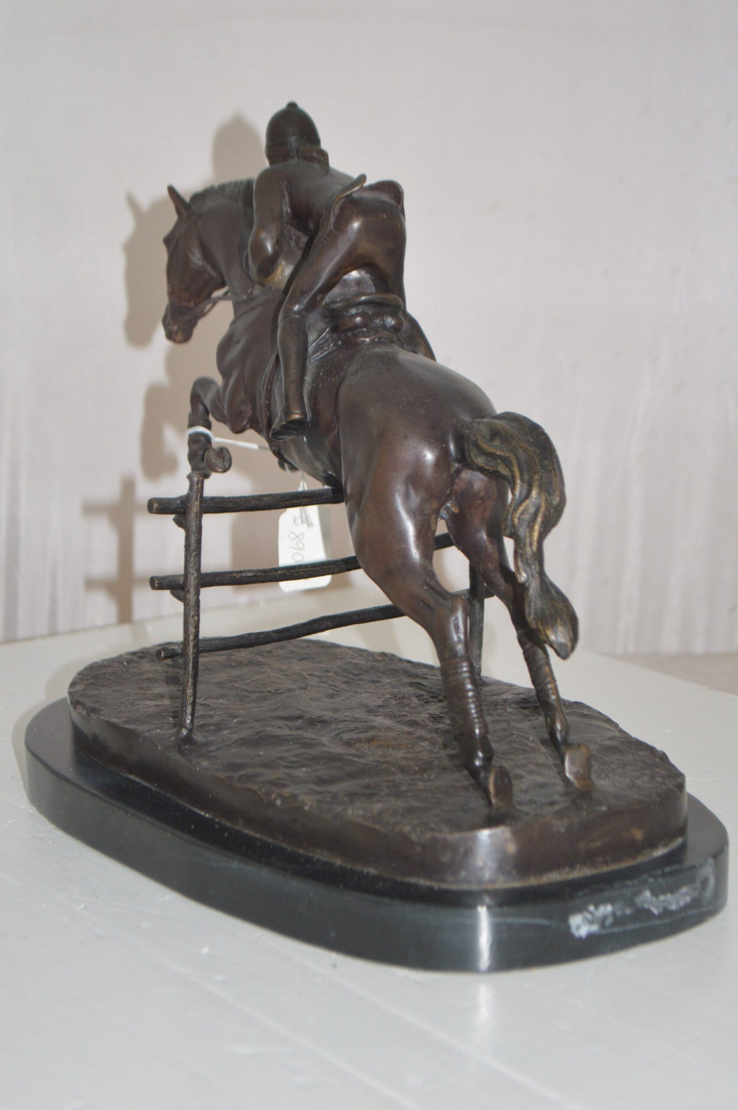 Jockey With Horse Jumping Over Hurdle Bronze Statue - Size: 14"L x 9"W x 13"H.