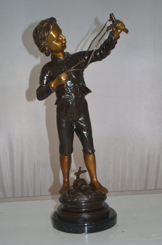 Boy with a Slingshot Bronze Statue -  Size: 12"L x 7"W x 21"H.