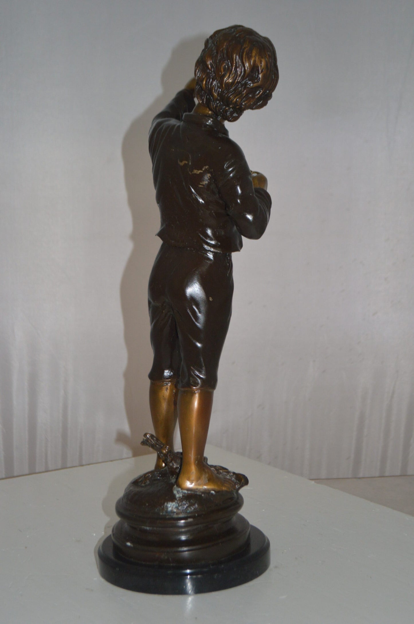 Boy with a Slingshot Bronze Statue -  Size: 12"L x 7"W x 21"H.