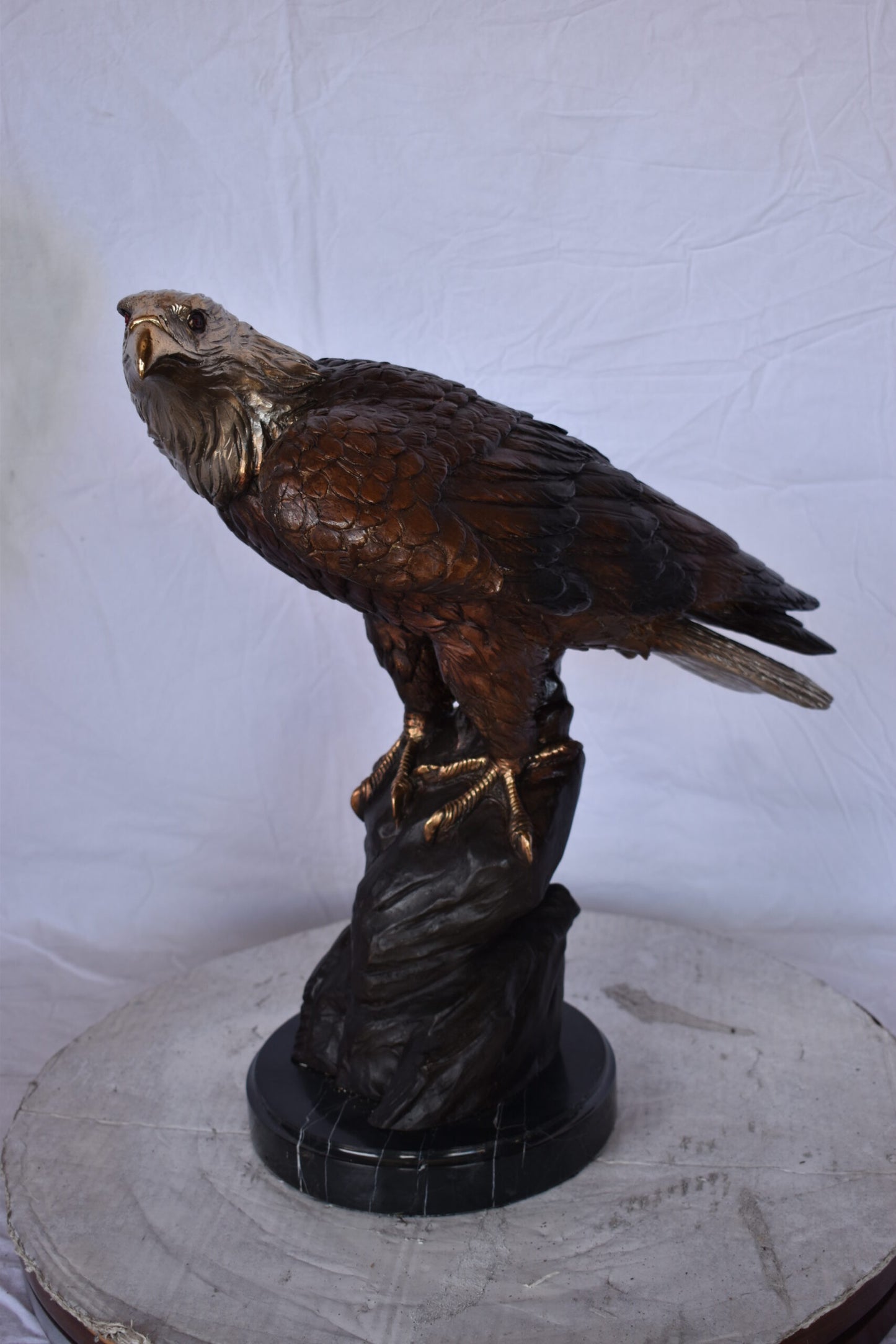 Eagle on Rock Bronze Statue Mounted on Marble Base - Size: 10"L x 22"W x 21"H.