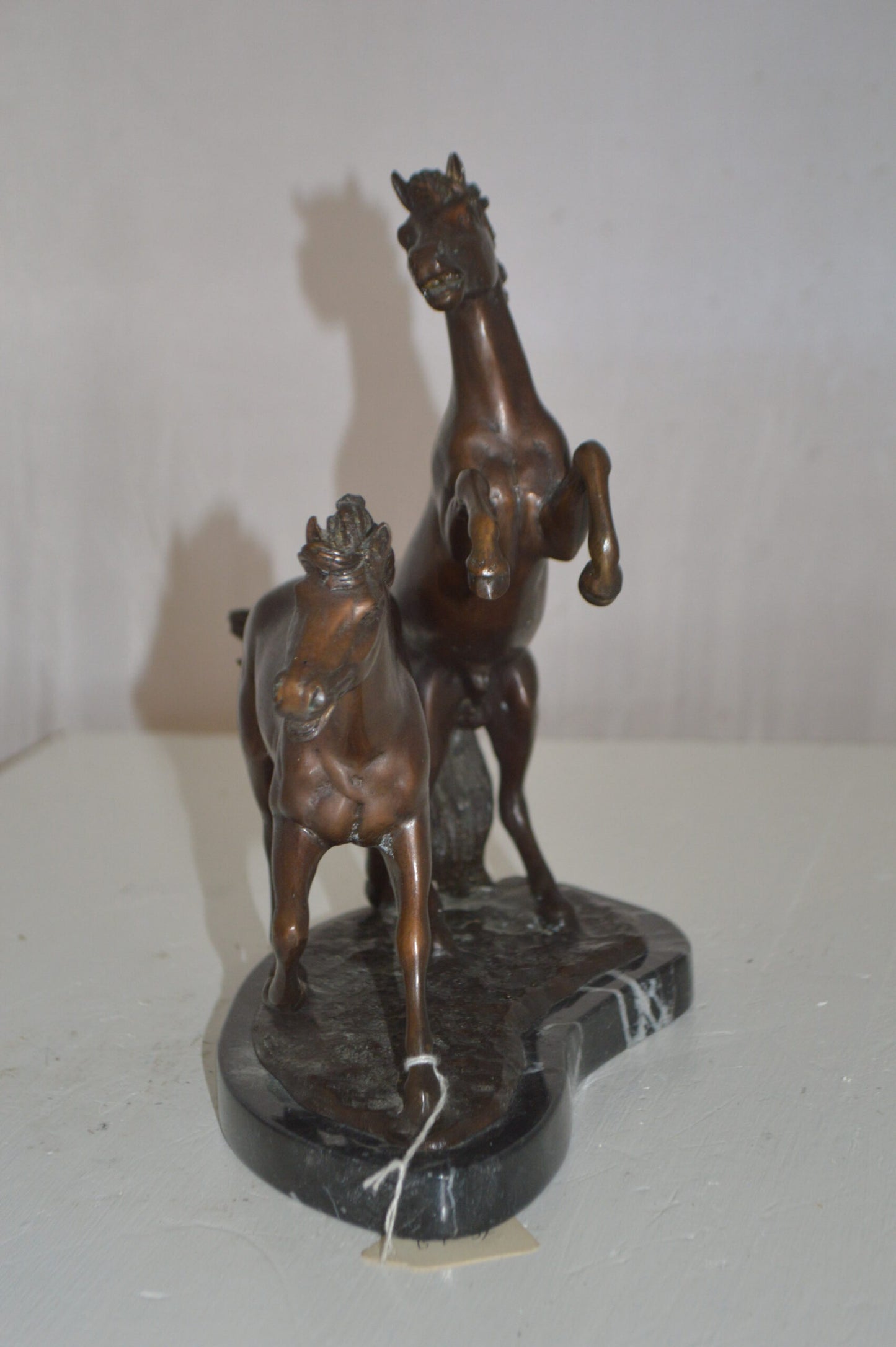 Two Horses Running Bronze Statue - Size: 11"L x 5"W x 11"H.