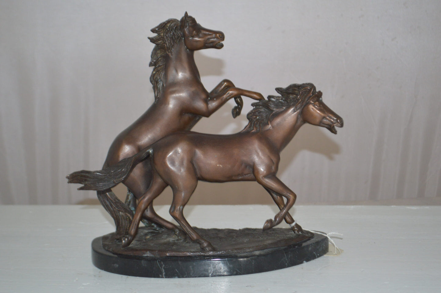 Two Horses Running Bronze Statue -  Size: 11"L x 5"W x 11"H.
