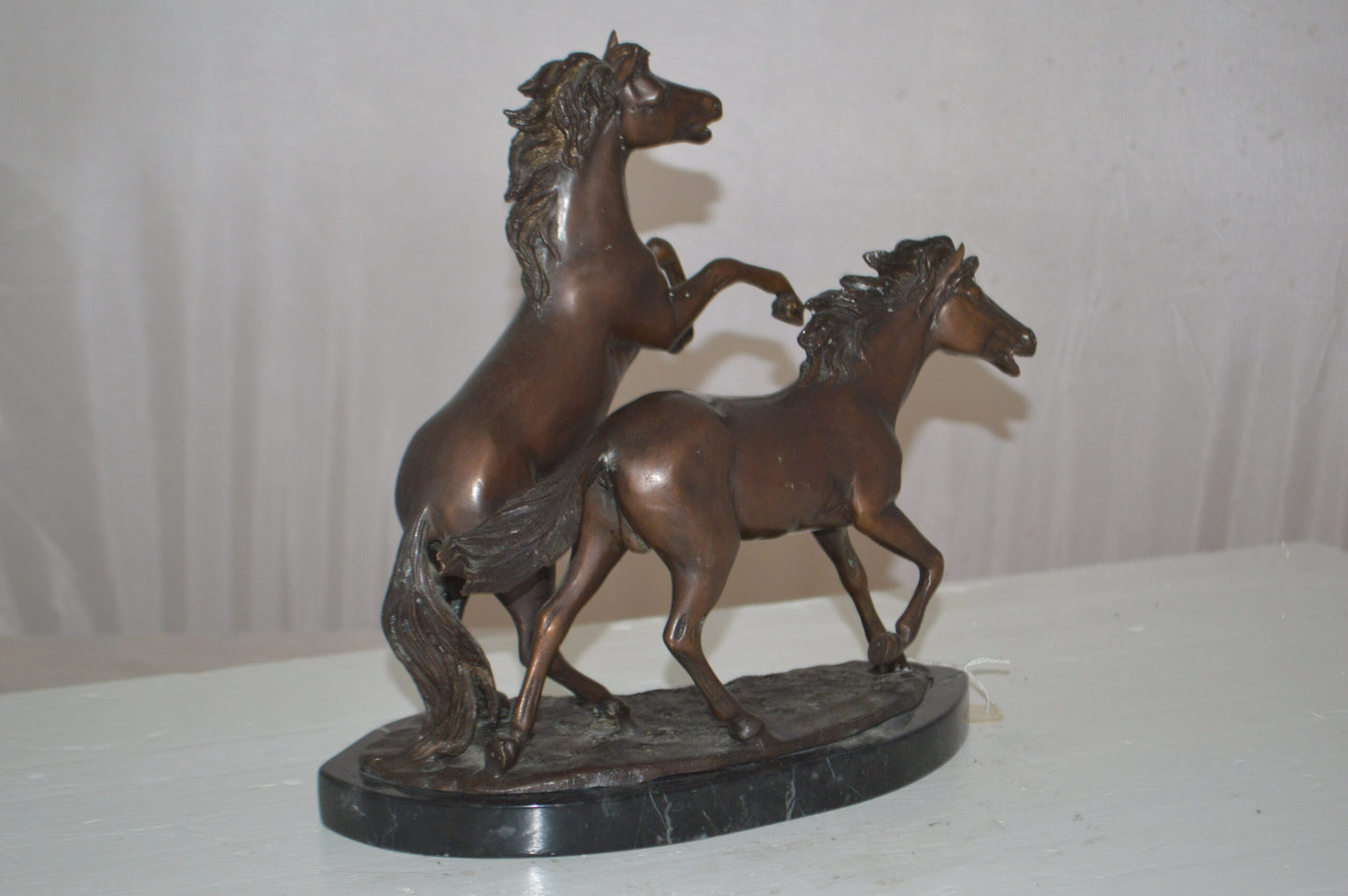 Two Horses Running Bronze Statue -  Size: 11"L x 5"W x 11"H.