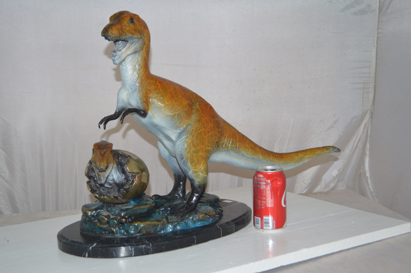 Dinosaur and baby Dino Bronze Statue -  Size: 26"L x 11"W x 18"H.