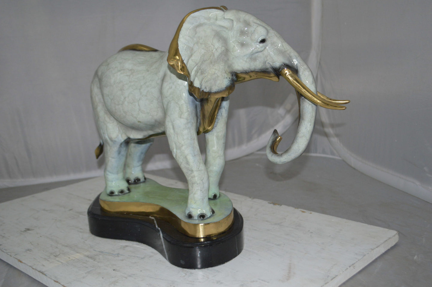 Elephant trunk Down Bronze Statue -  Size: 28"L x 12"W x 17"H.
