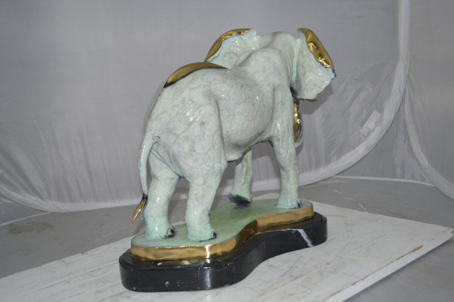Elephant trunk Down Bronze Statue -  Size: 28"L x 12"W x 17"H.