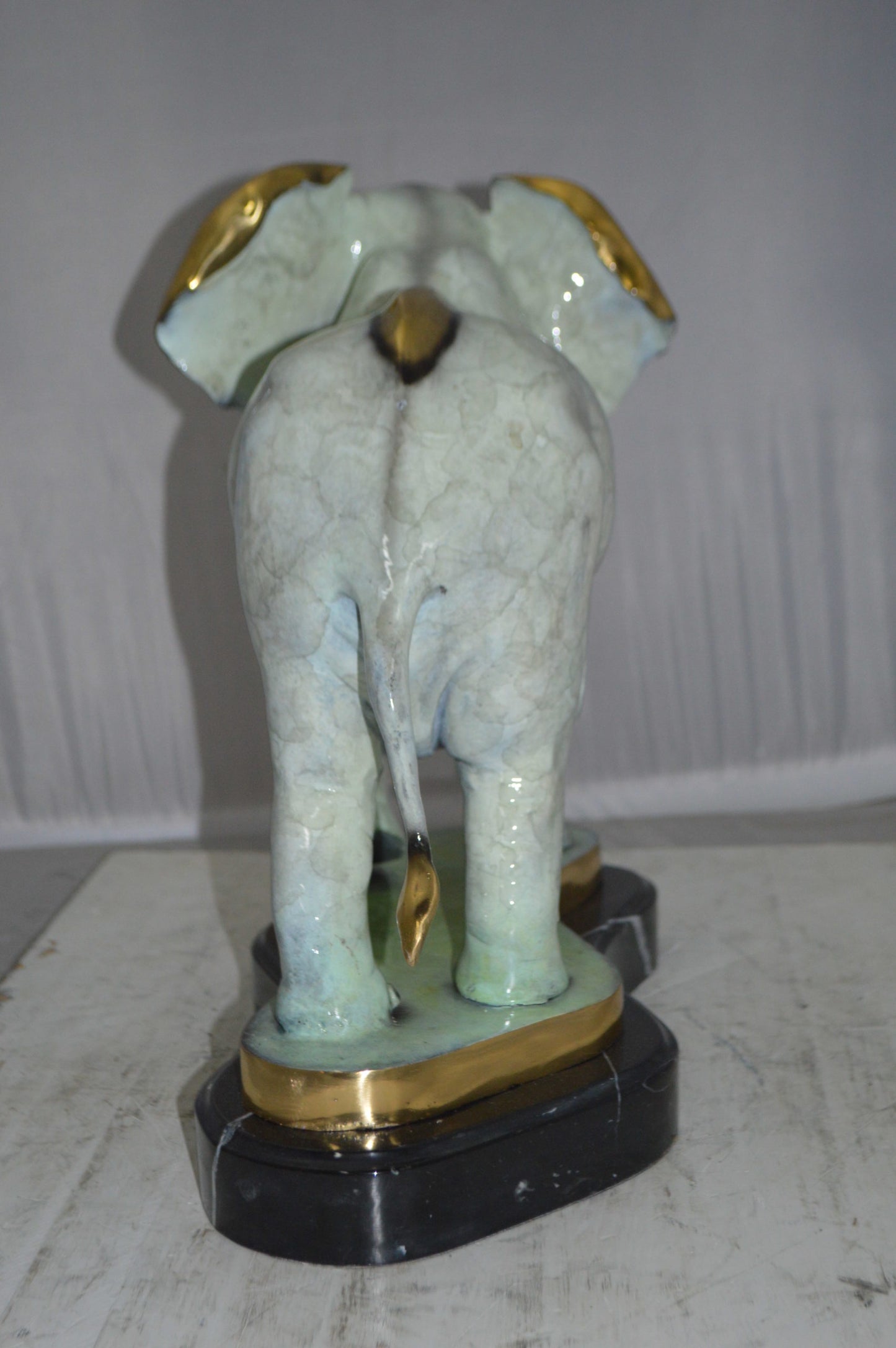 Elephant trunk Down Bronze Statue -  Size: 28"L x 12"W x 17"H.
