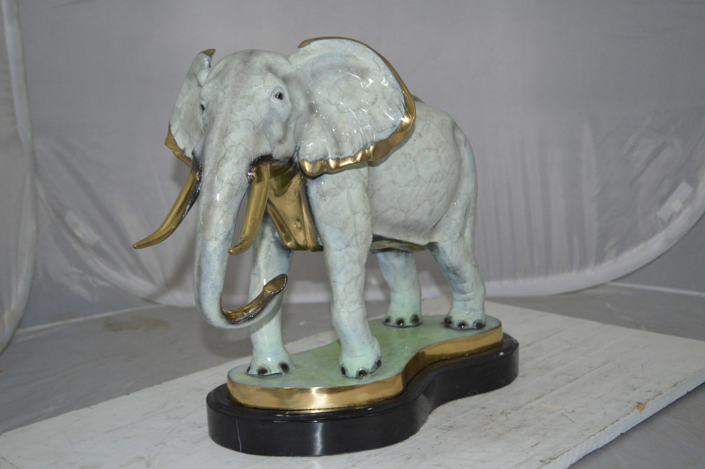 Elephant trunk Down Bronze Statue -  Size: 28"L x 12"W x 17"H.