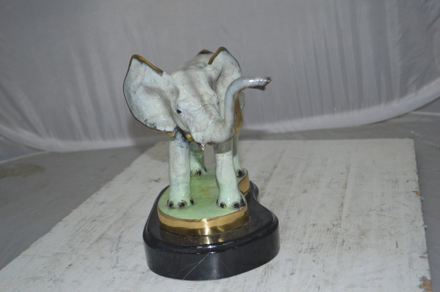 Elephant trunk Up Bronze Statue - Size: 16"L x 9"W x 10"H.