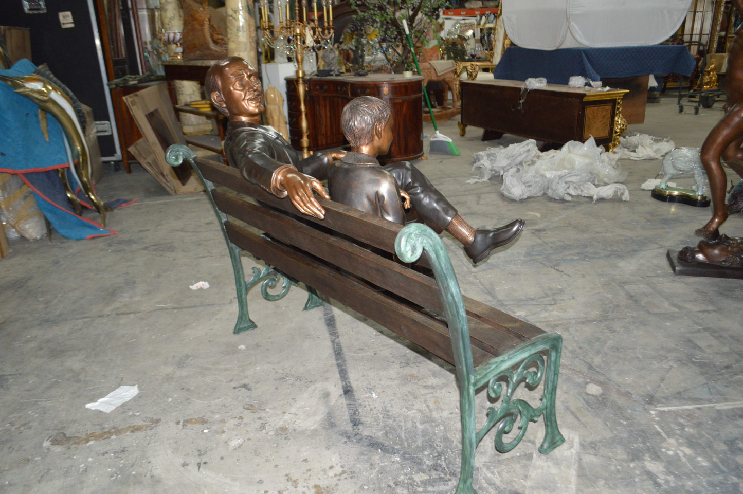 Grandfather an Grandson on a Bench Bronze Statue - Size: 53"L x 32"W x 44"H.