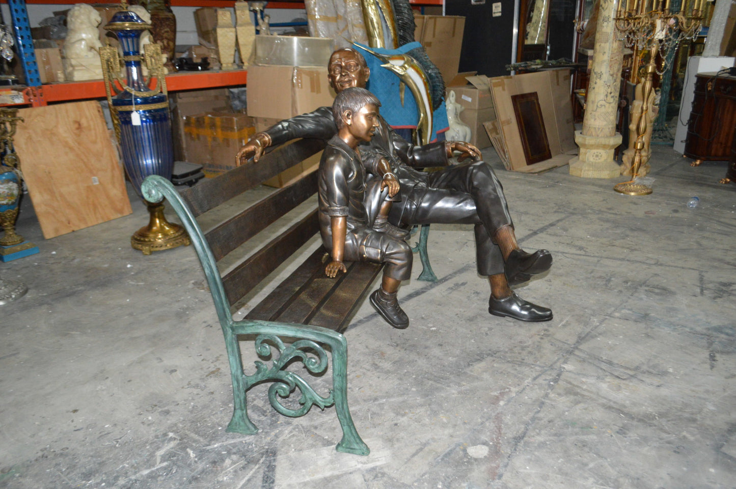 Grandfather an Grandson on a Bench Bronze Statue - Size: 53"L x 32"W x 44"H.