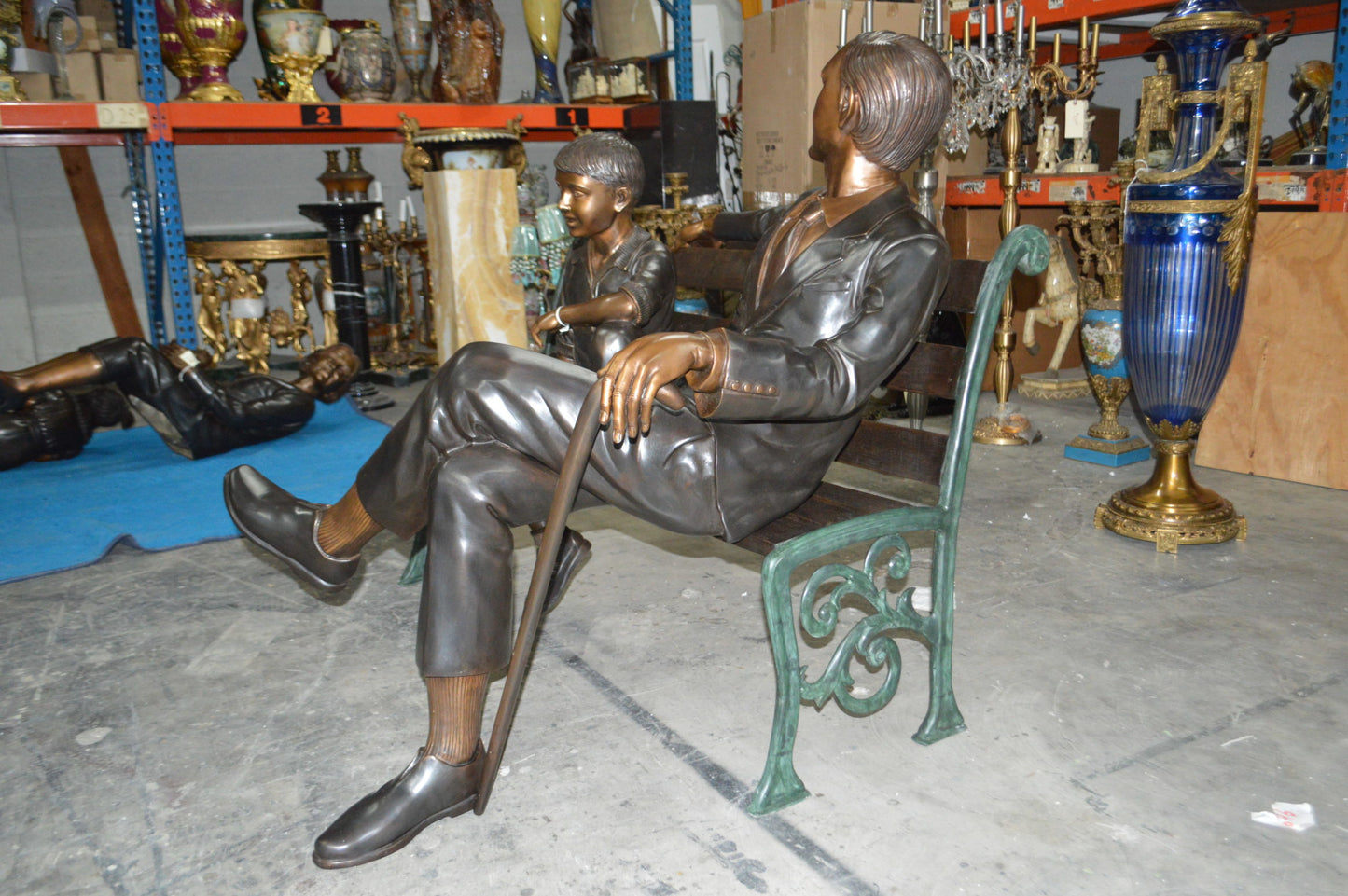 Grandfather an Grandson on a Bench Bronze Statue - Size: 53"L x 32"W x 44"H.