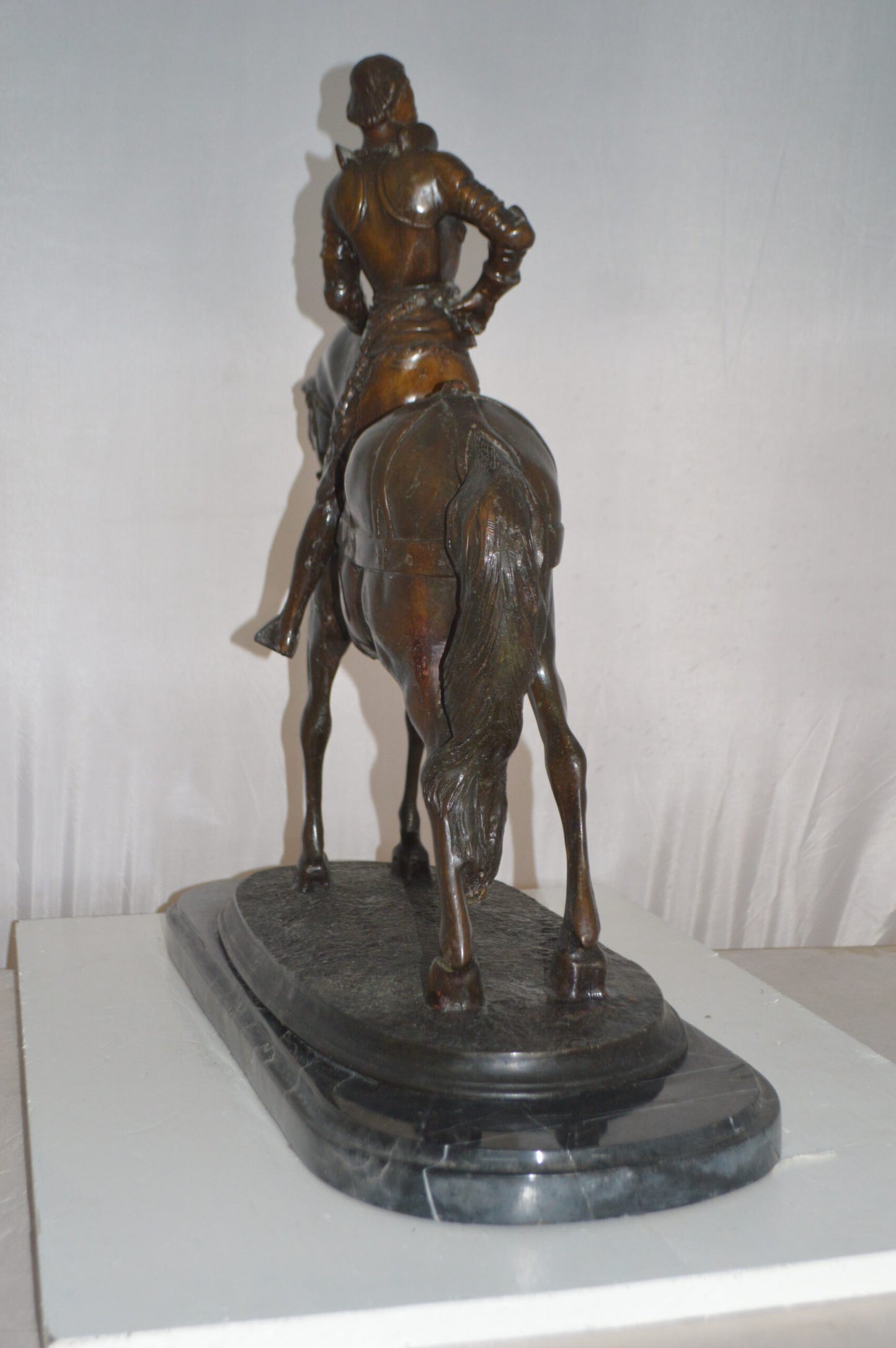 Man on his Horse Bronze Statue - Size: 30"L x 10"W x 25"H.