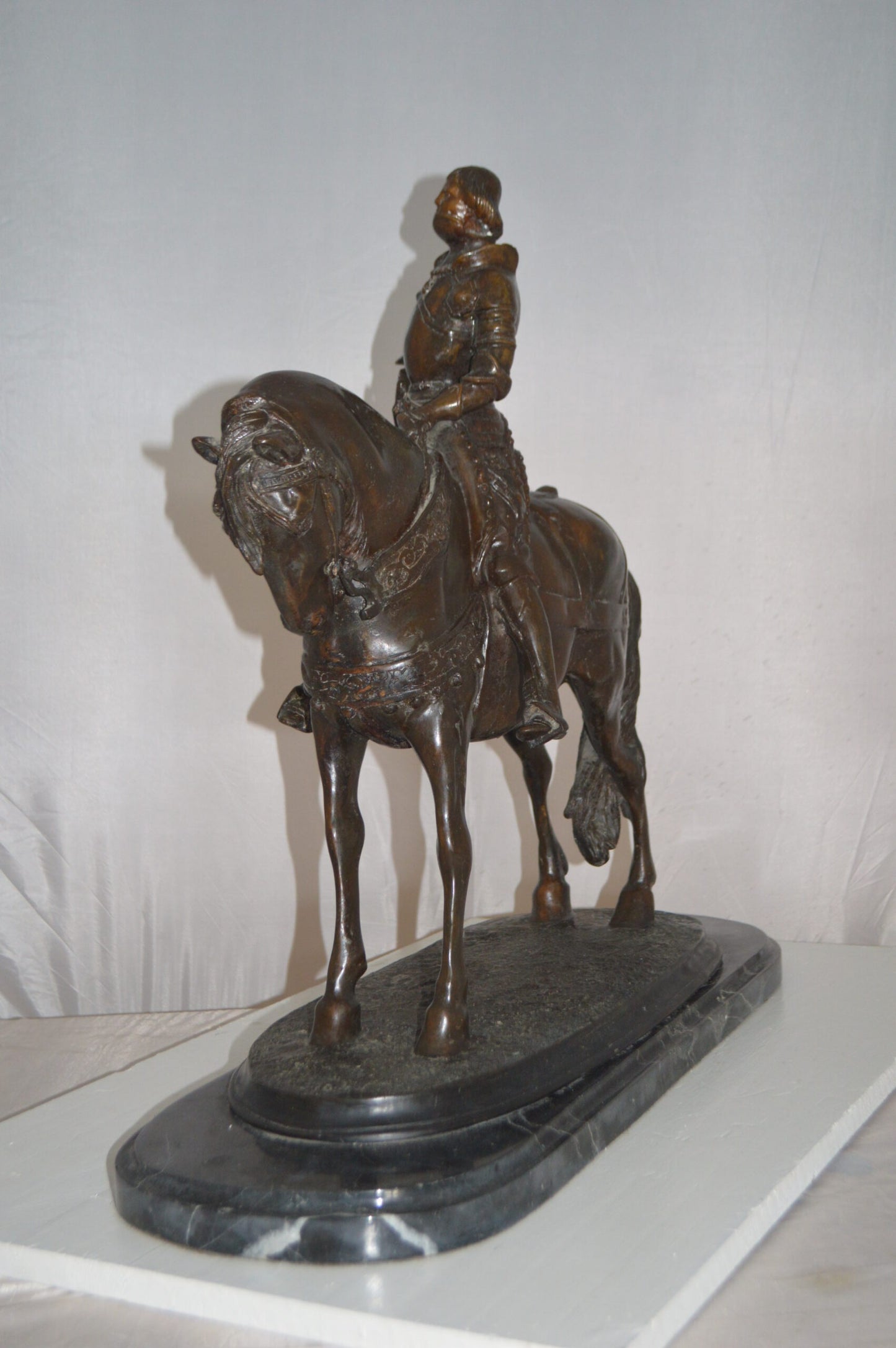 Man on his Horse Bronze Statue - Size: 30"L x 10"W x 25"H.
