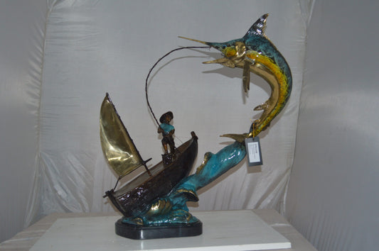 Old Man Fishing a Large Catch Bronze Statue -  Size: 27"L x 13"W x 30"H.