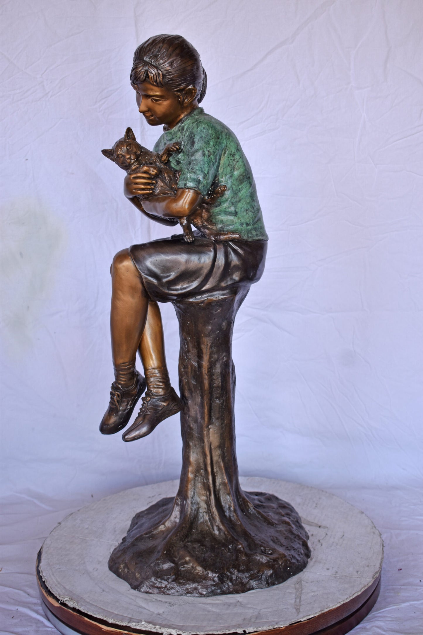 Girl Sitting on A Log with Her Cat Bronze Statue - Size: 15"L x 15"W x 35"H.
