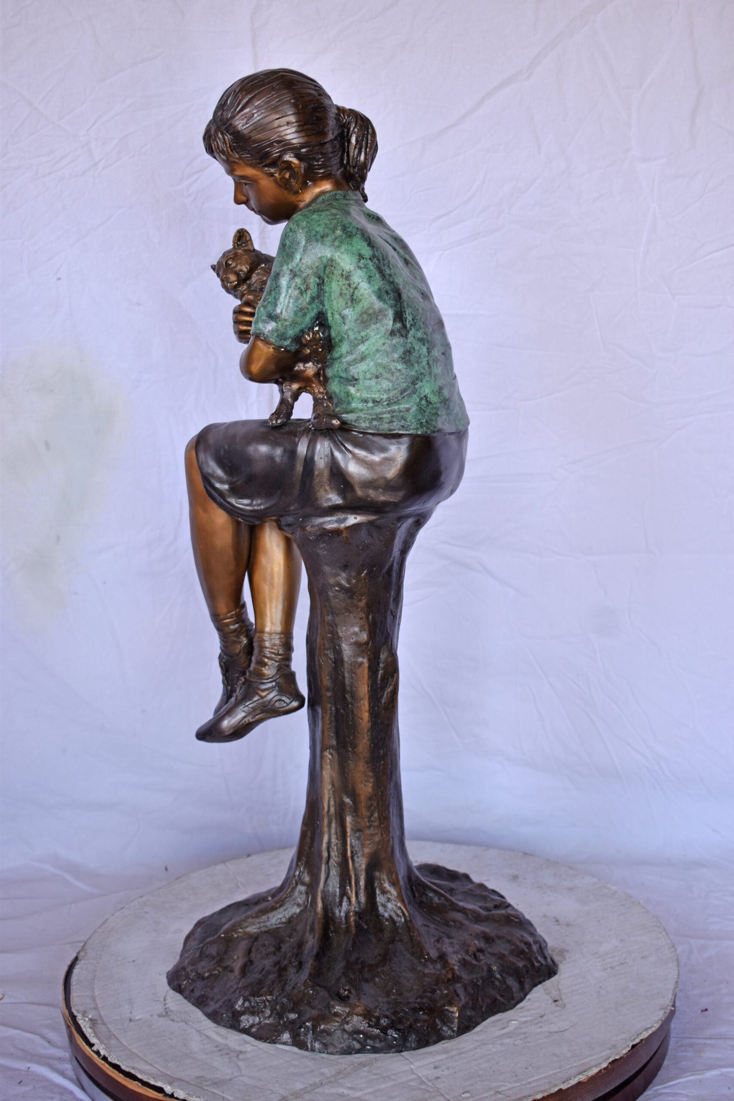 Girl Sitting on A Log with Her Cat Bronze Statue - Size: 15"L x 15"W x 35"H.
