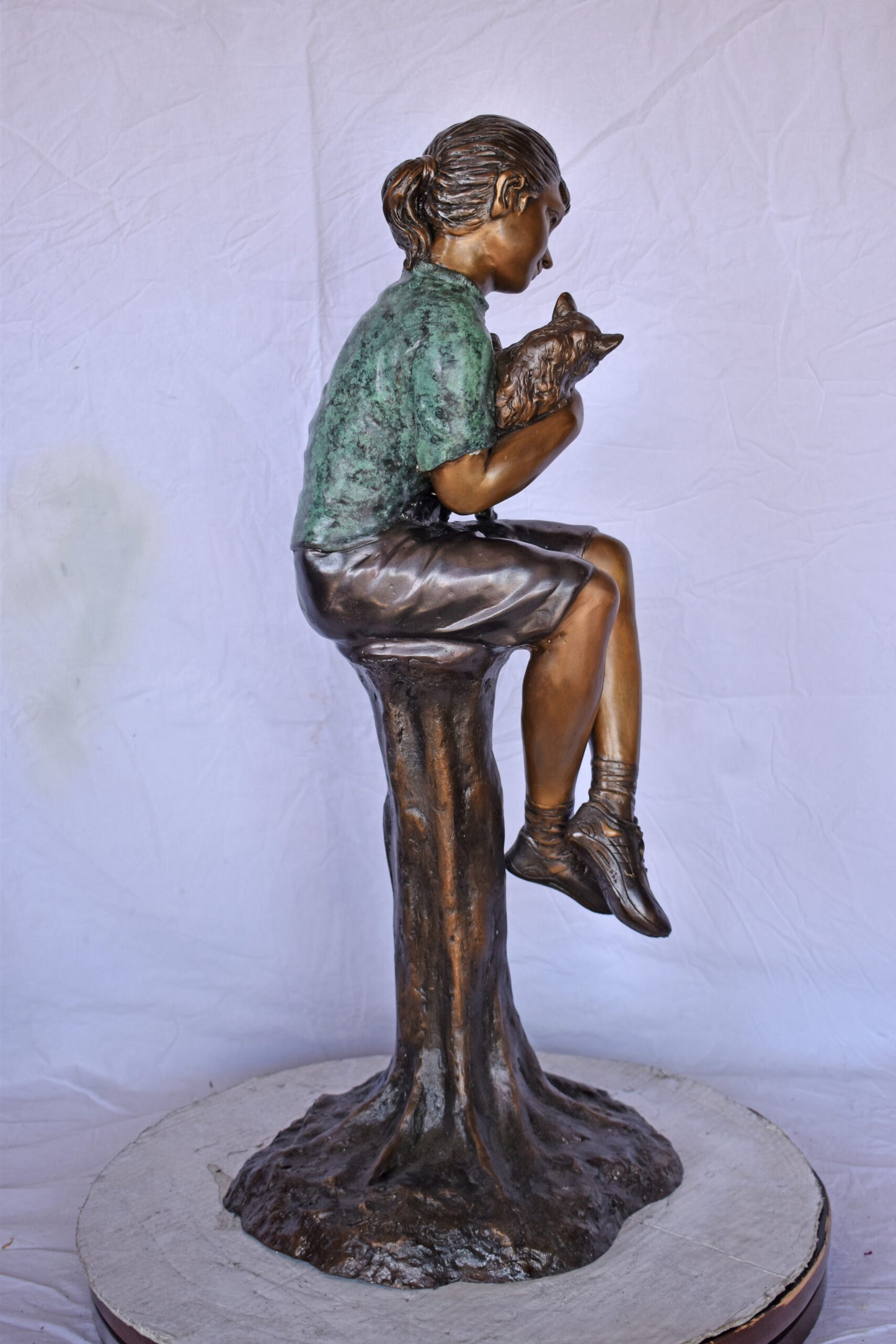 Girl Sitting on A Log with Her Cat Bronze Statue - Size: 15"L x 15"W x 35"H.