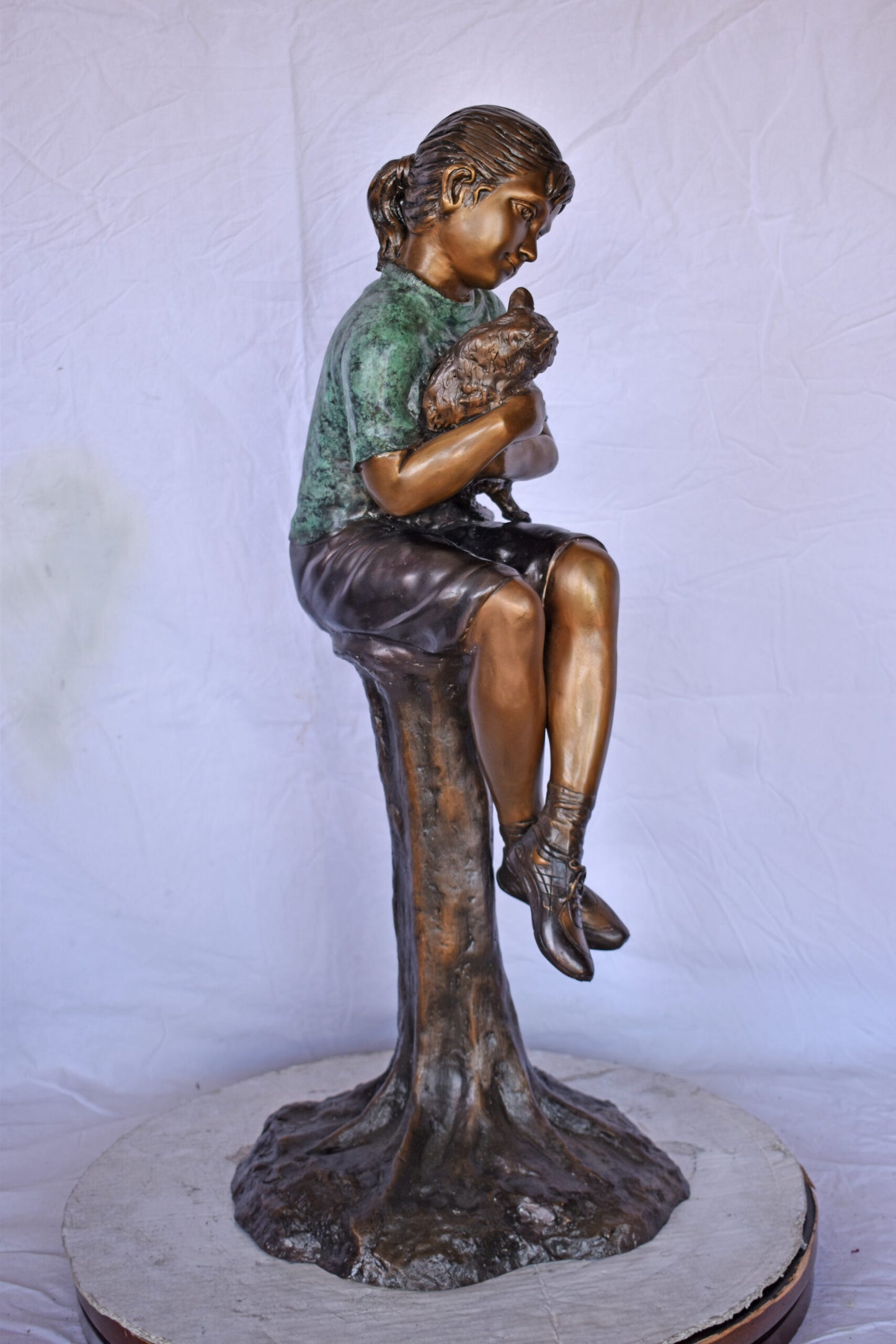 Girl Sitting on A Log with Her Cat Bronze Statue - Size: 15"L x 15"W x 35"H.