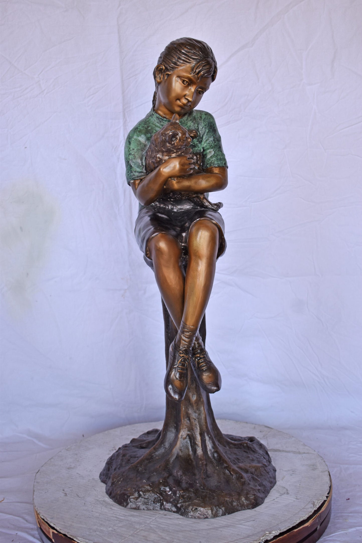 Girl Sitting on A Log with Her Cat Bronze Statue - Size: 15"L x 15"W x 35"H.