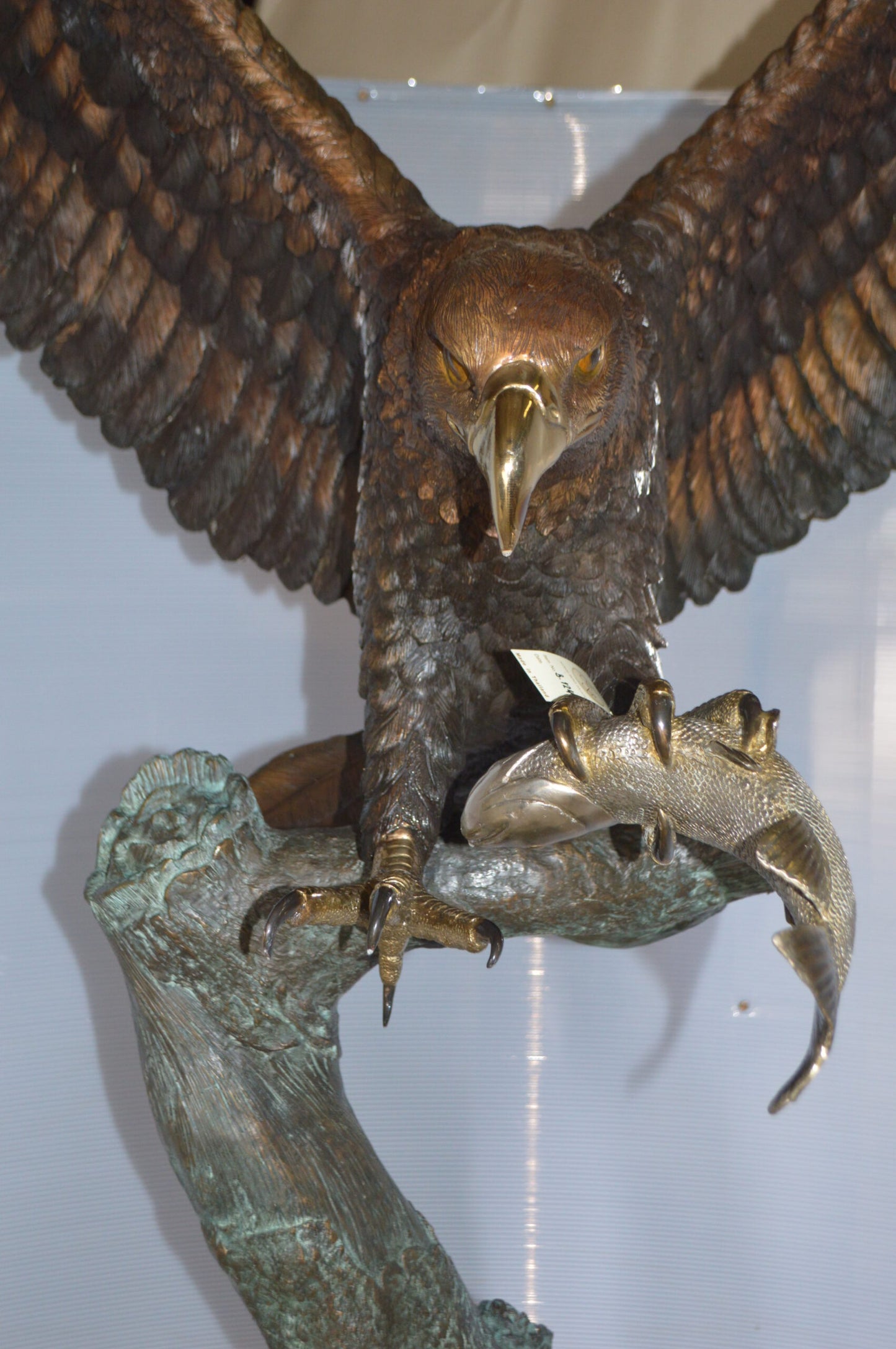 Landing Eagle on a Tree Giant Bronze Statue - Size: 72"L x 36"W x 88"H.